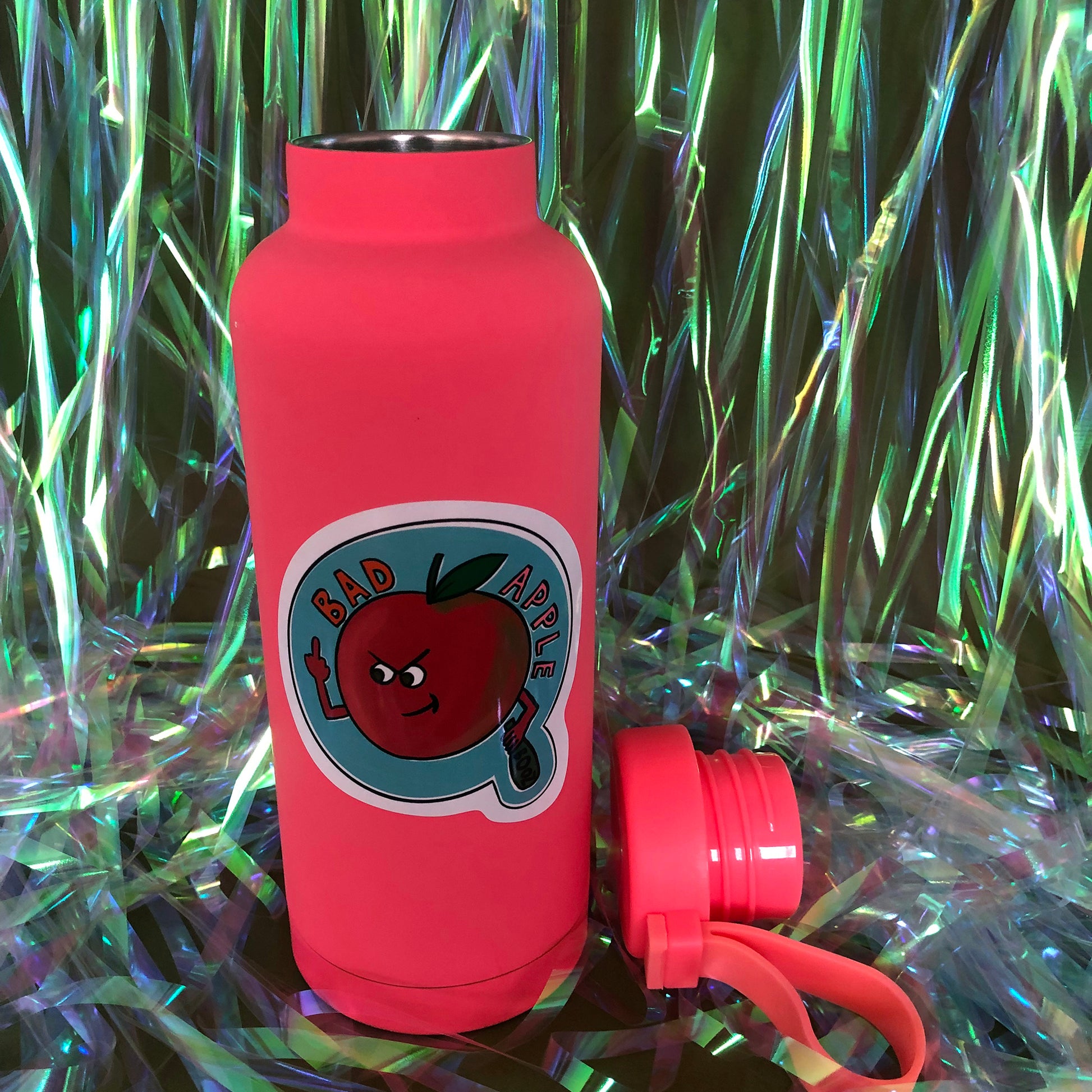Image shows a vinyl sticker featuring a red apple swearing and drinking with the wording 'Bad Apple'