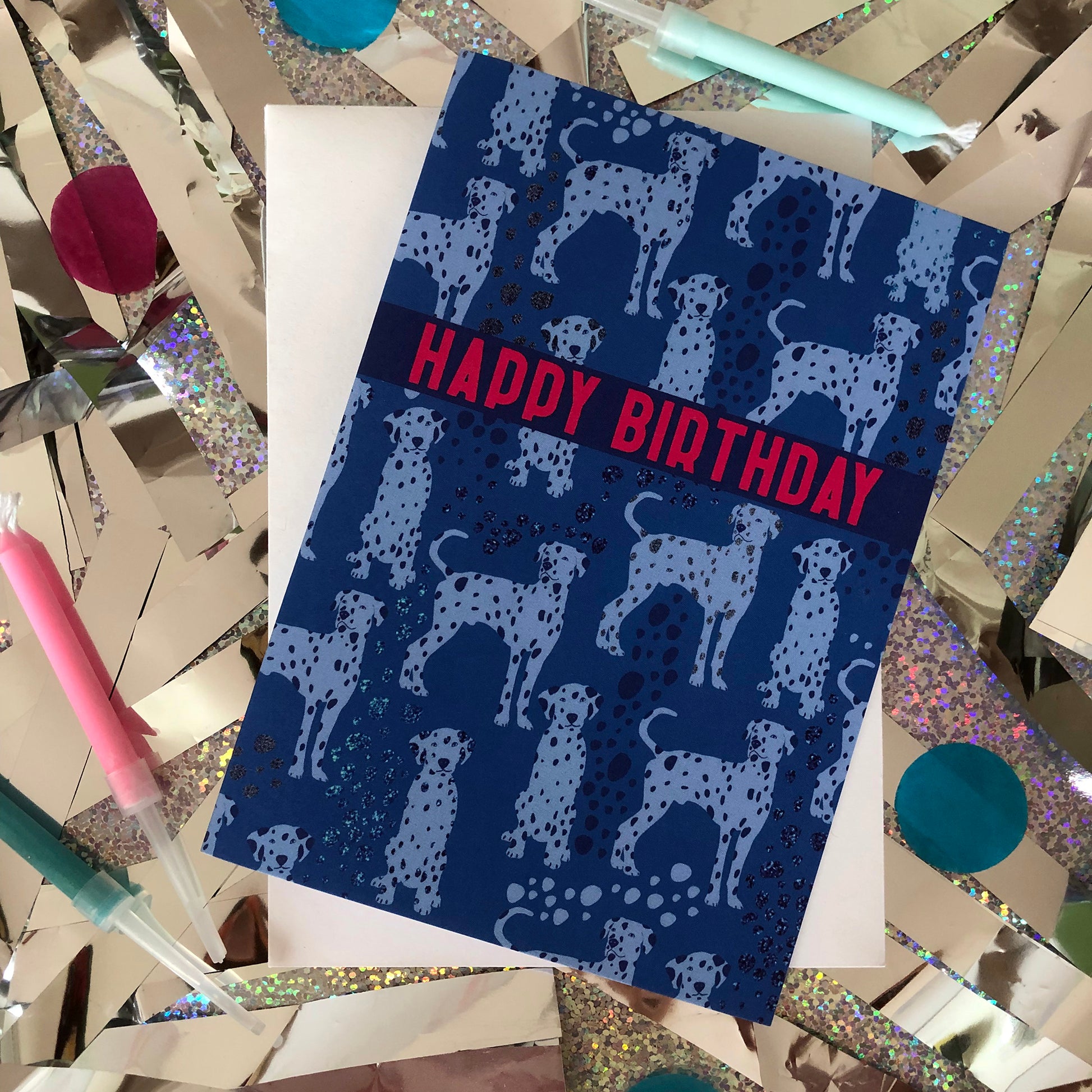 Blue Dalmatian print birthday card featuring a cute dog design on a blue background.