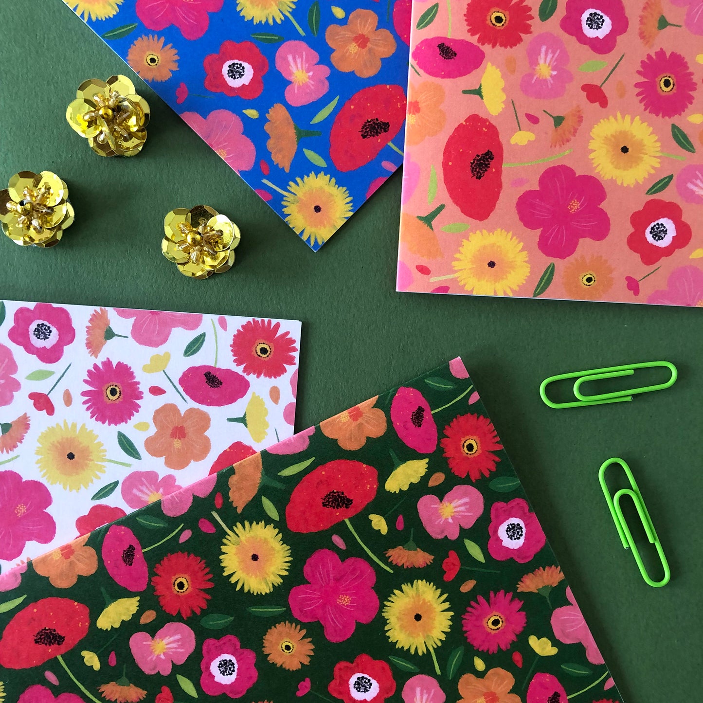 Image shows a set of 4 brightly coloured floral print notecards