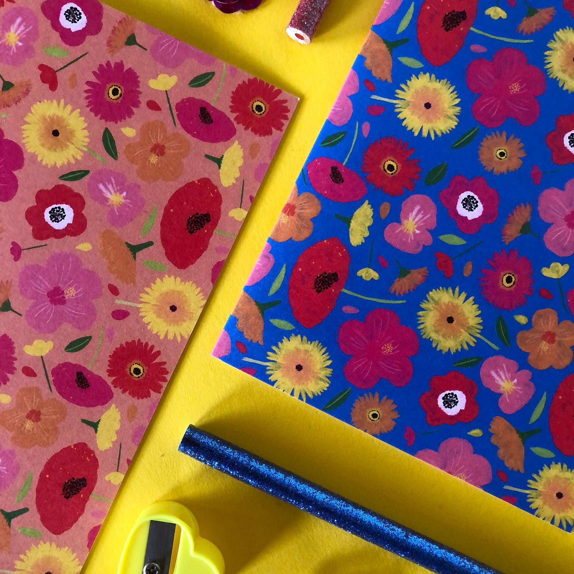 Image shows 2 of a set of 4 brightly coloured floral print notecards
