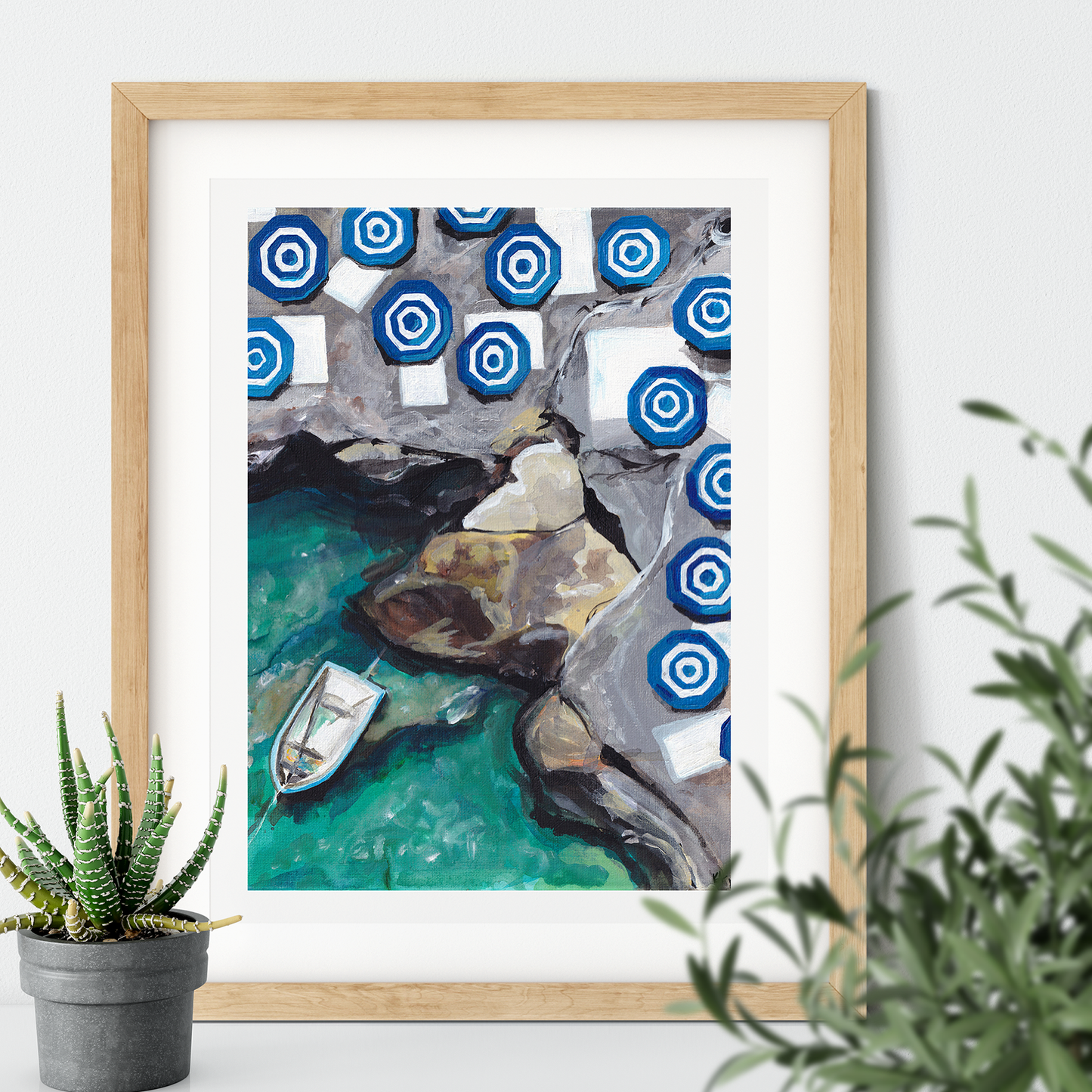 Image of a framed print of a painting of capri featuring striped umbrellas and aqua water with rocks and a small boat.