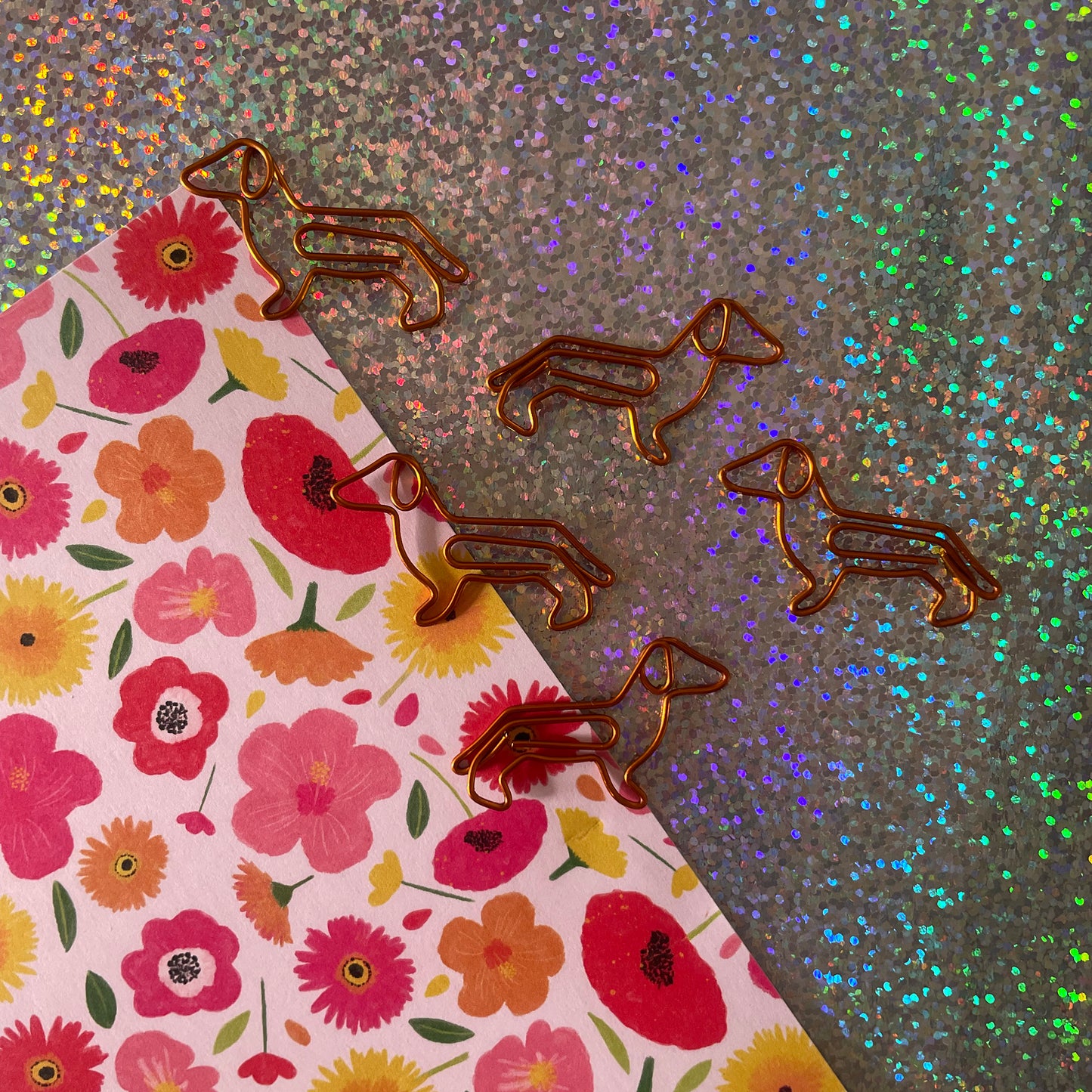 Image shows a cute set of Dachshund shaped paper clips