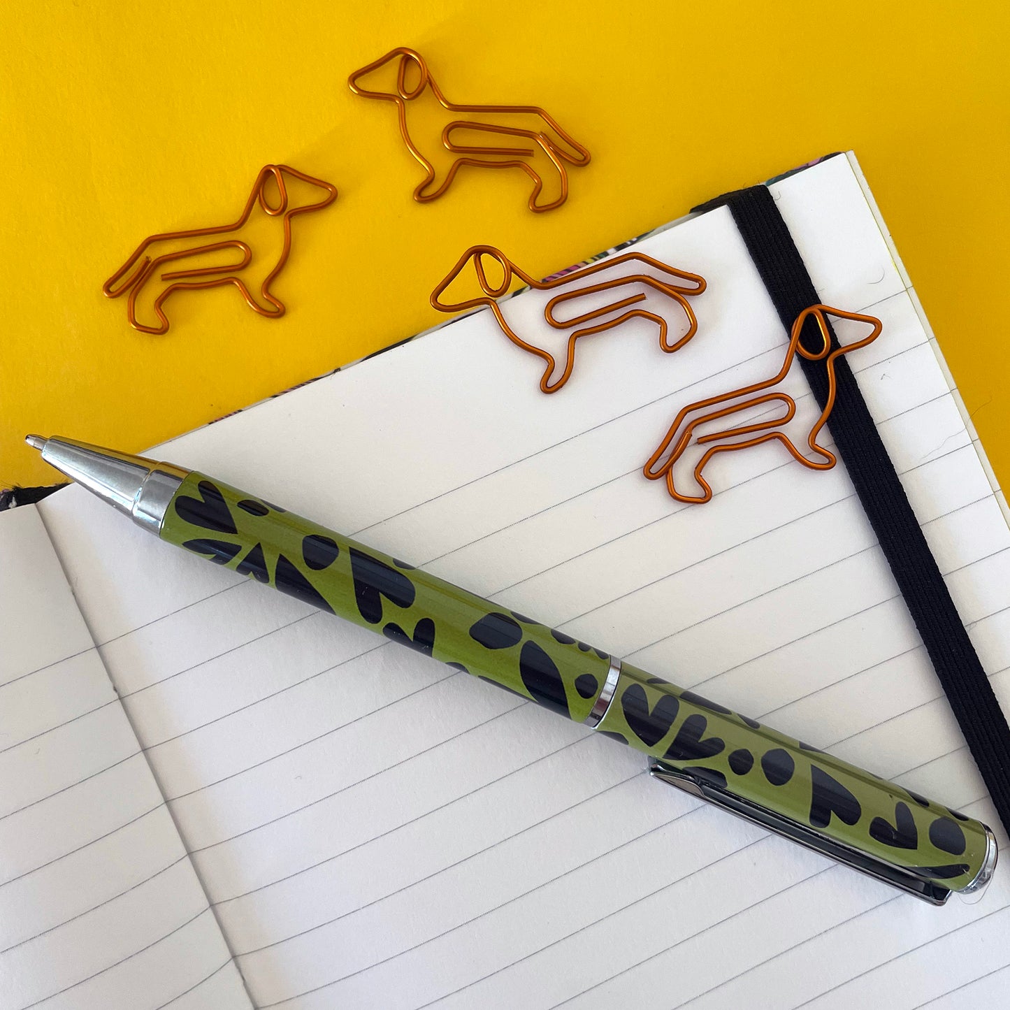 Image shows a cute set of Dachshund shaped paper clips