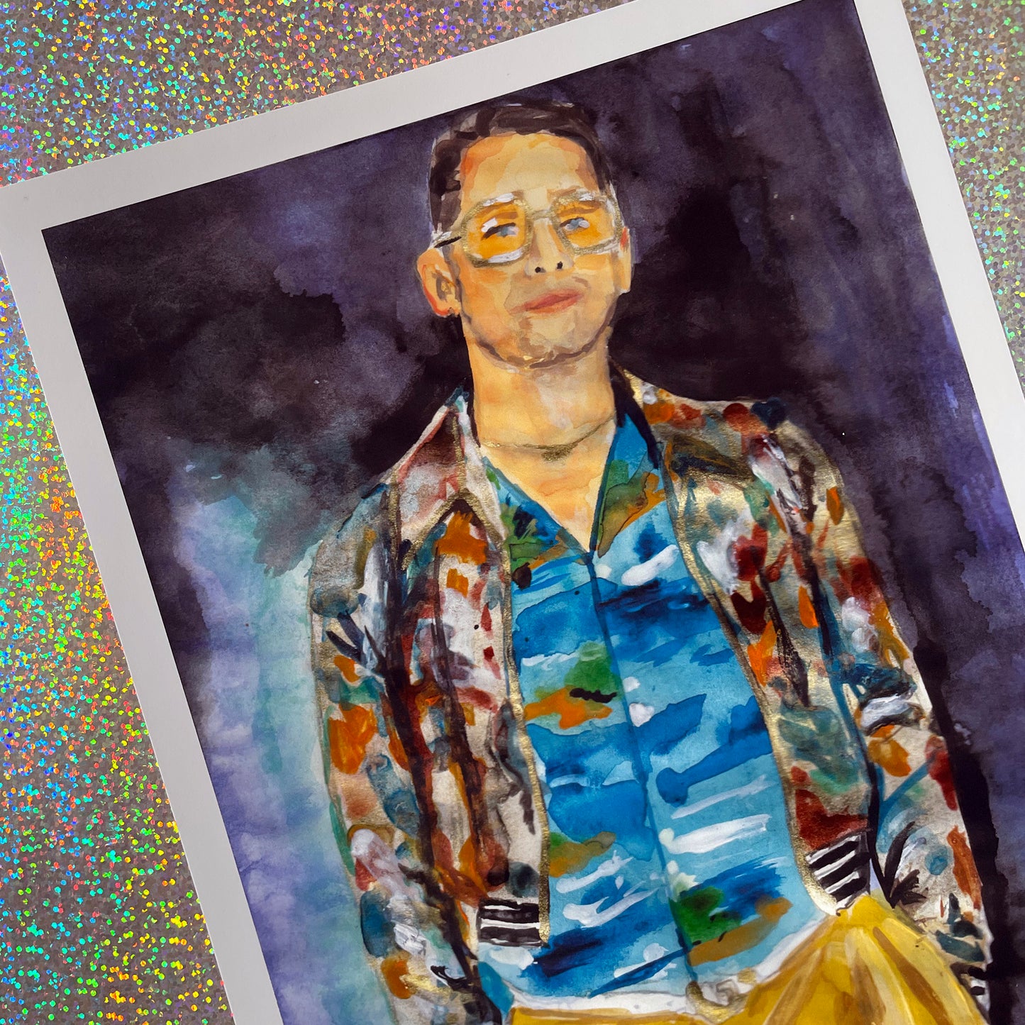 Image shows a framed fashion illustration of Gucci's Love Parade featuring actor Macaukley Culkin in a patterned jacket and shirt