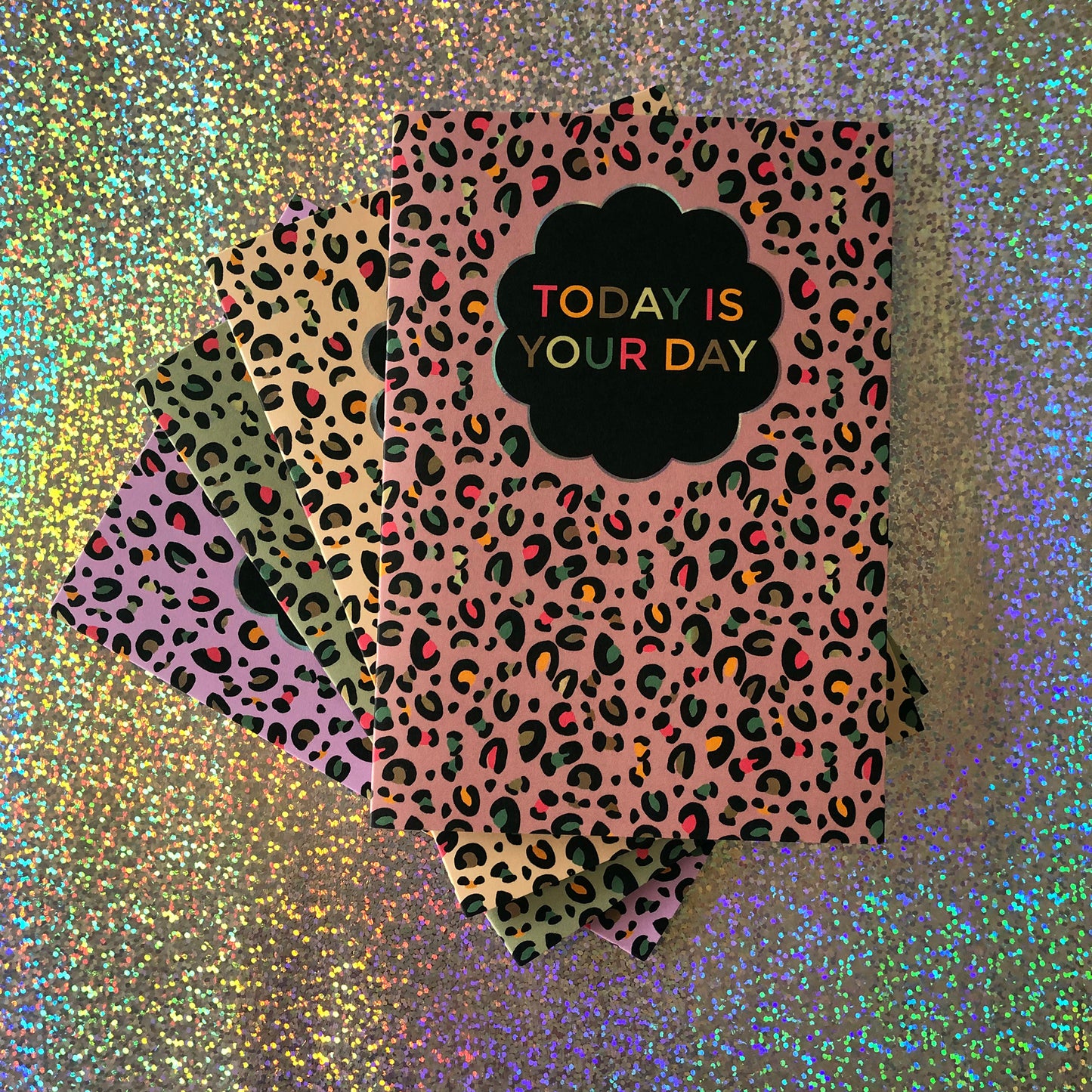Image shows a greetings card with a pink leopard Print pattern and the words 'Today is your day '