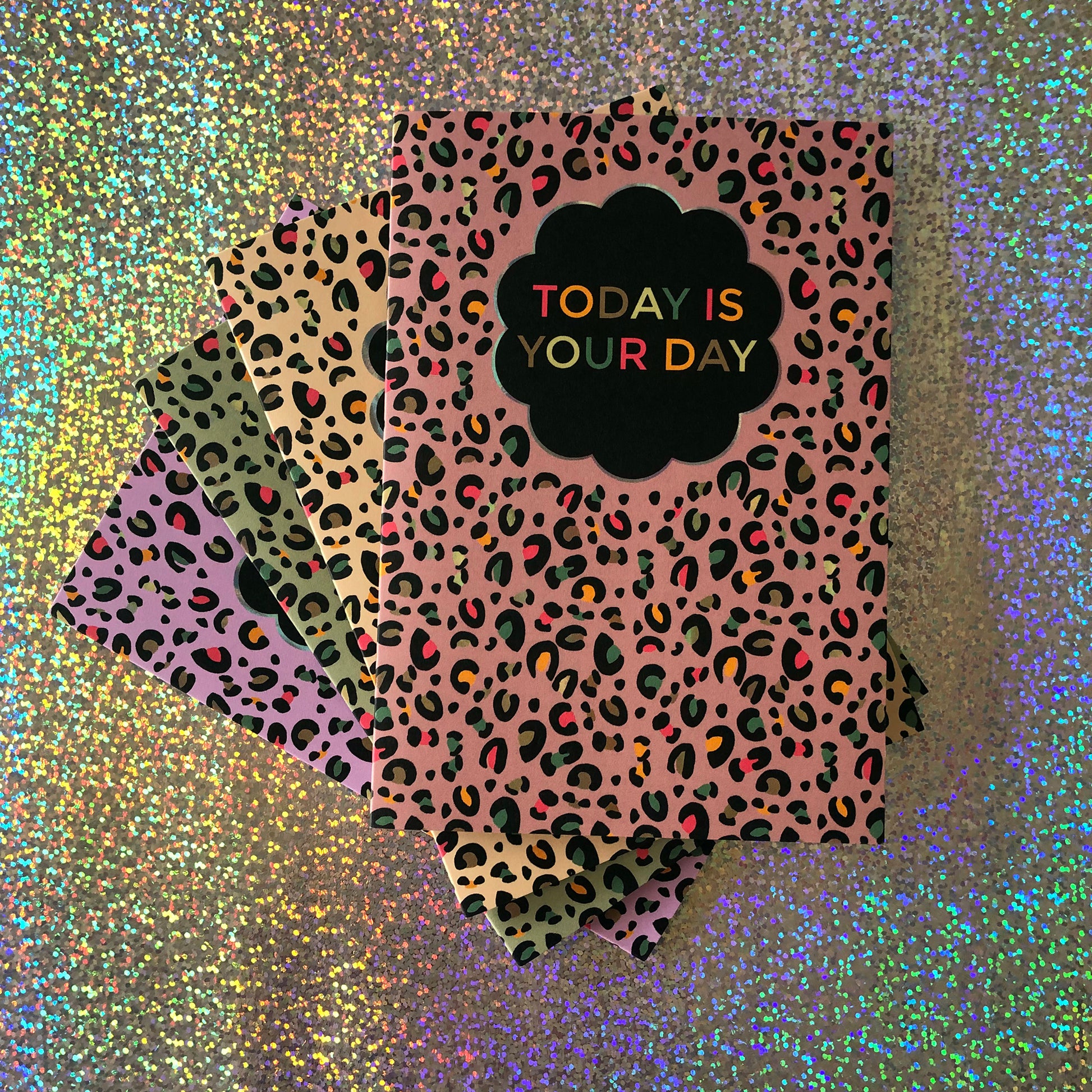 Image shows a greetings card with a pink leopard Print pattern and the words 'Today is your day '