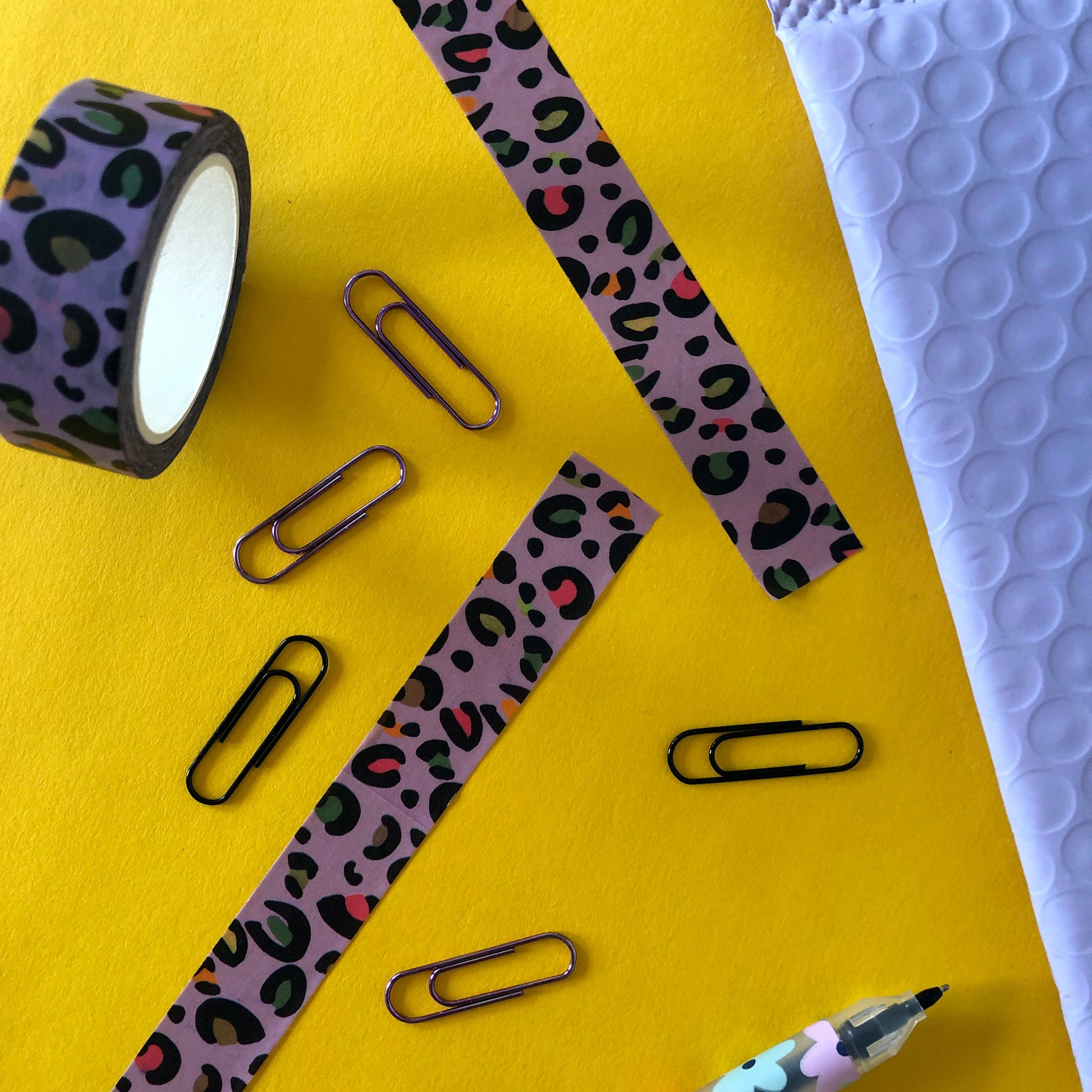 Image shows a stylish purple leopard print washi tape with pops of neon colour