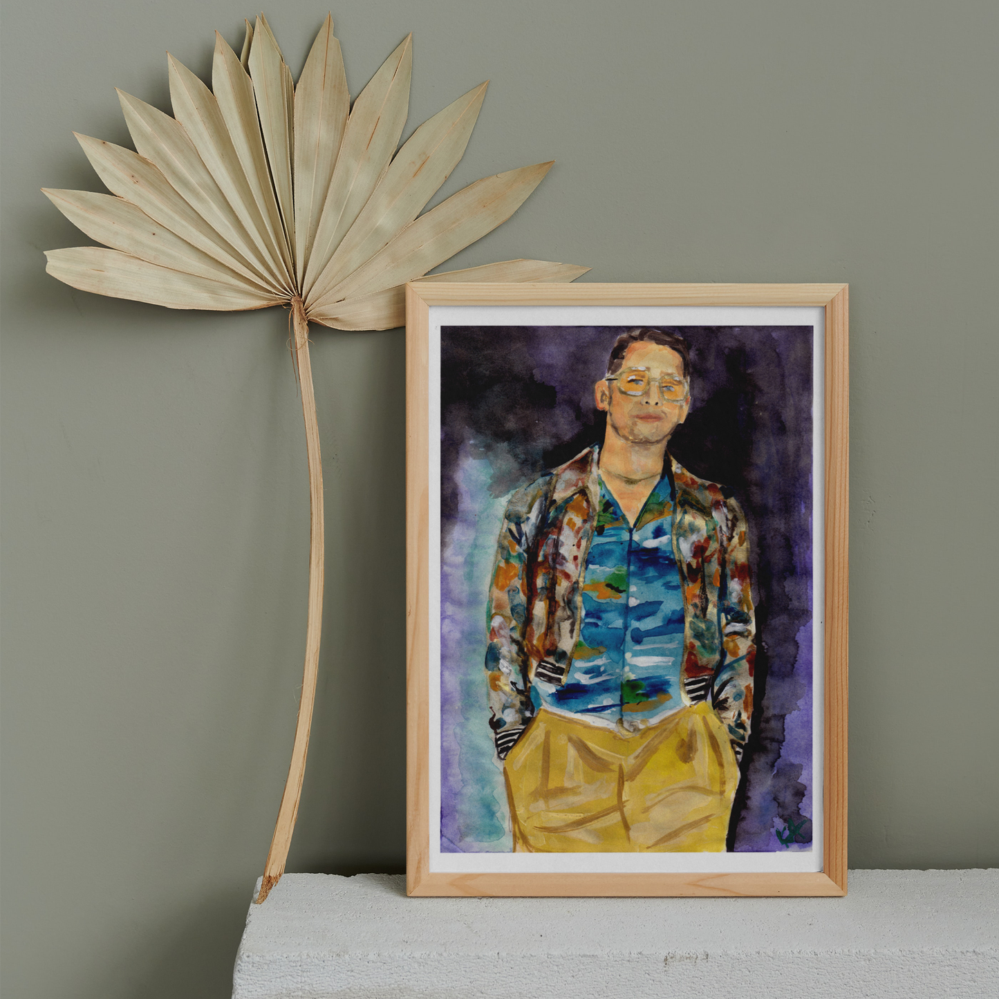 Image shows a framed fashion illustration of Gucci's Love Parade featuring actor Macaukley Culkin in a patterned jacket and shirt