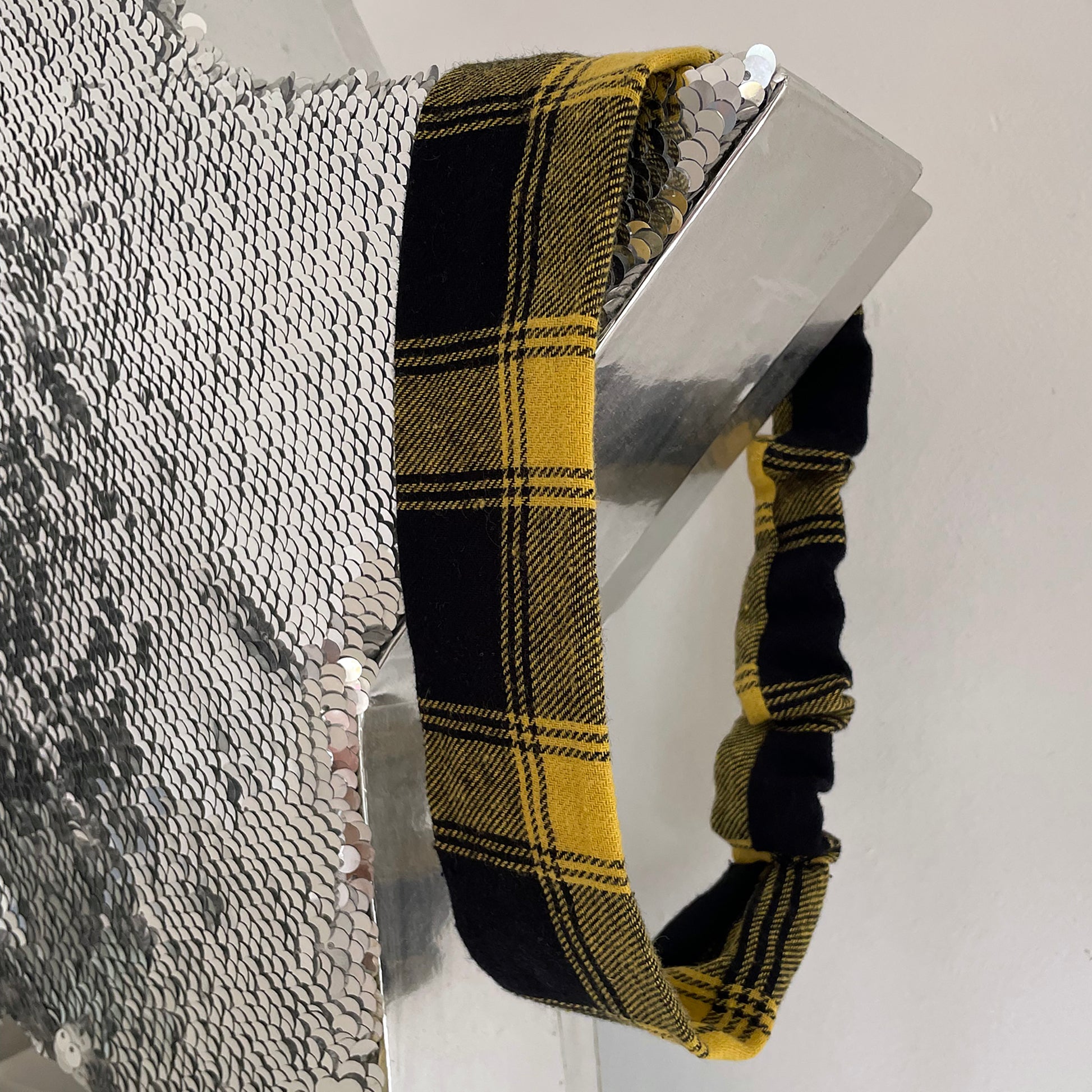 Image shows a super soft mustard plaid hair band.