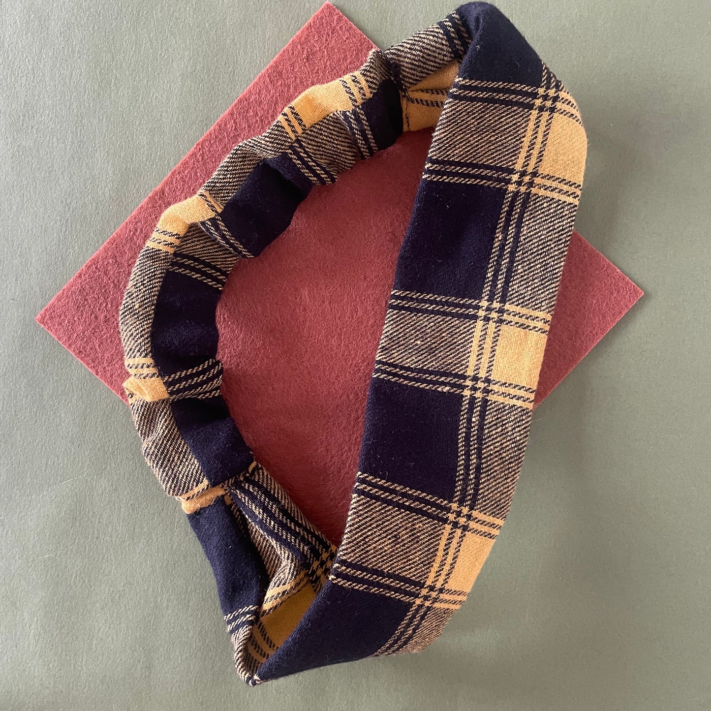 Image shows a super soft mustard plaid hair band.