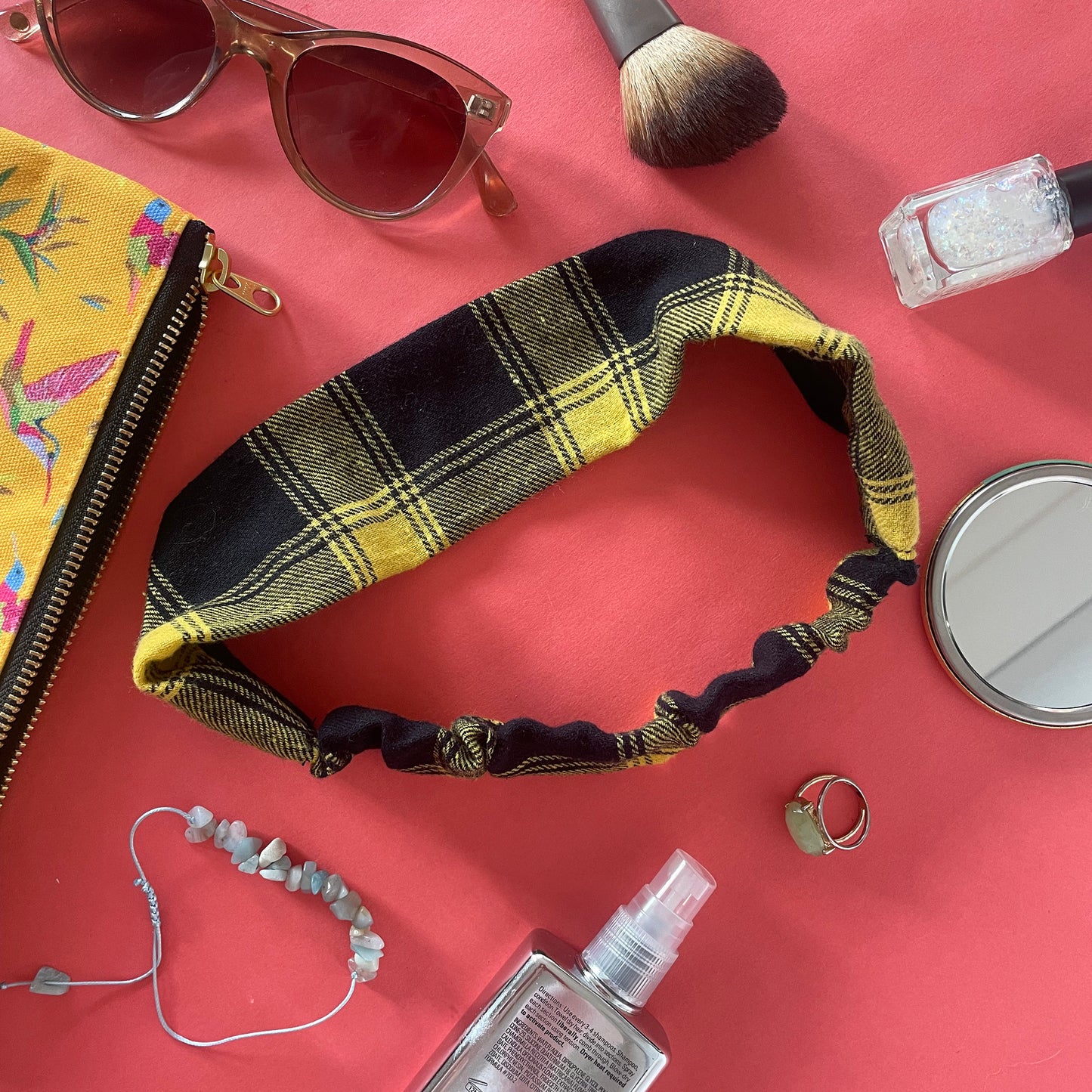 Image shows a super soft mustard plaid hair band.