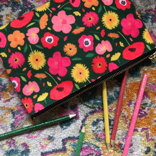 Useful zip pouch in a lush green colour with a pretty pink, yellow and orange floral print