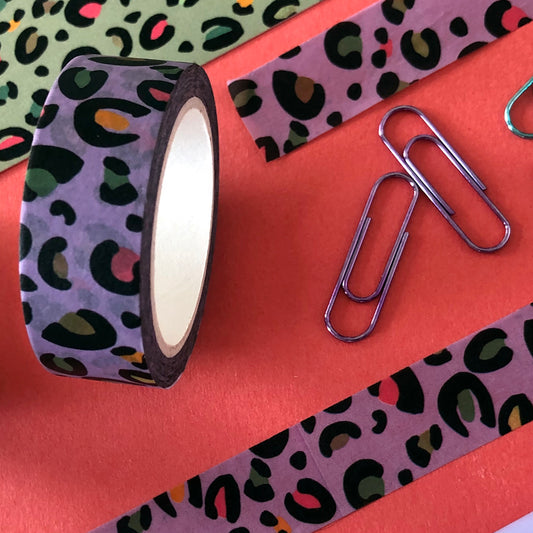Image shows a purple leopard print washi tape with pops of neon colour