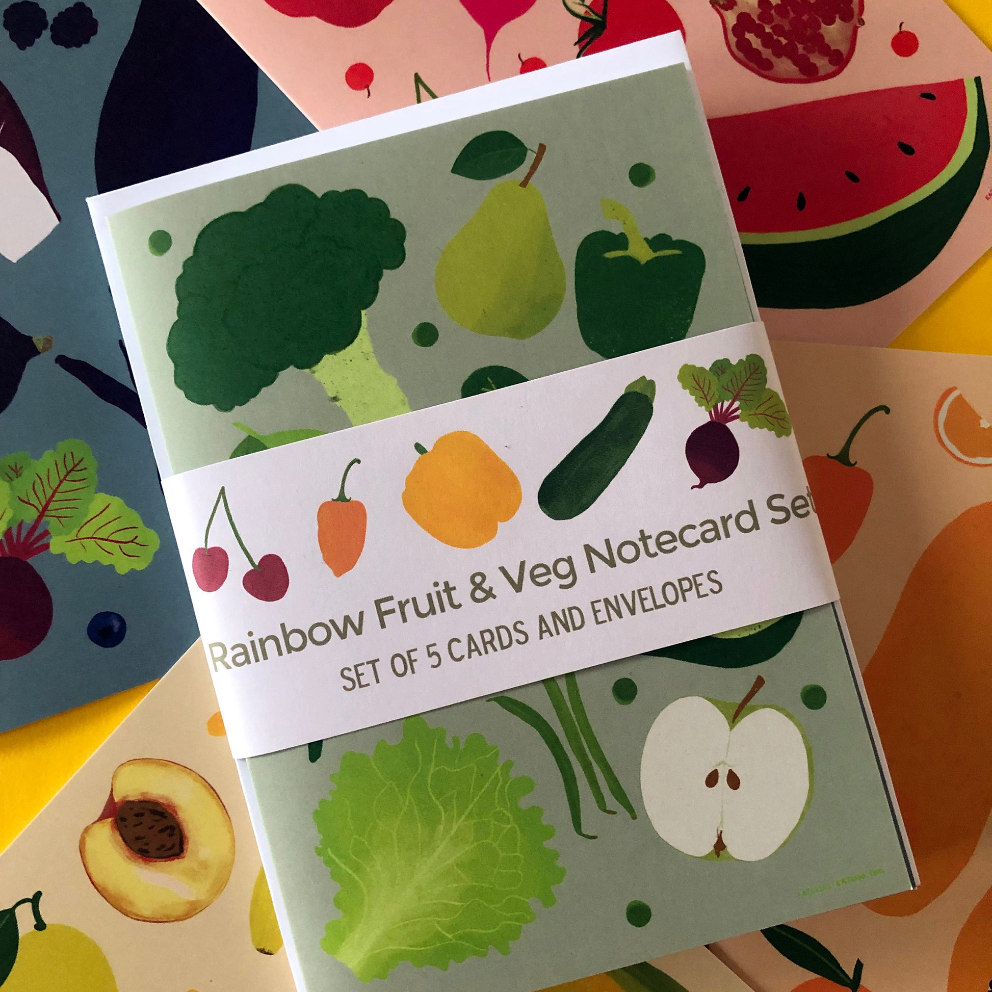 Image shows a set of 5 rainbow, illustrated notecards featuring fresh fruits and veggies..