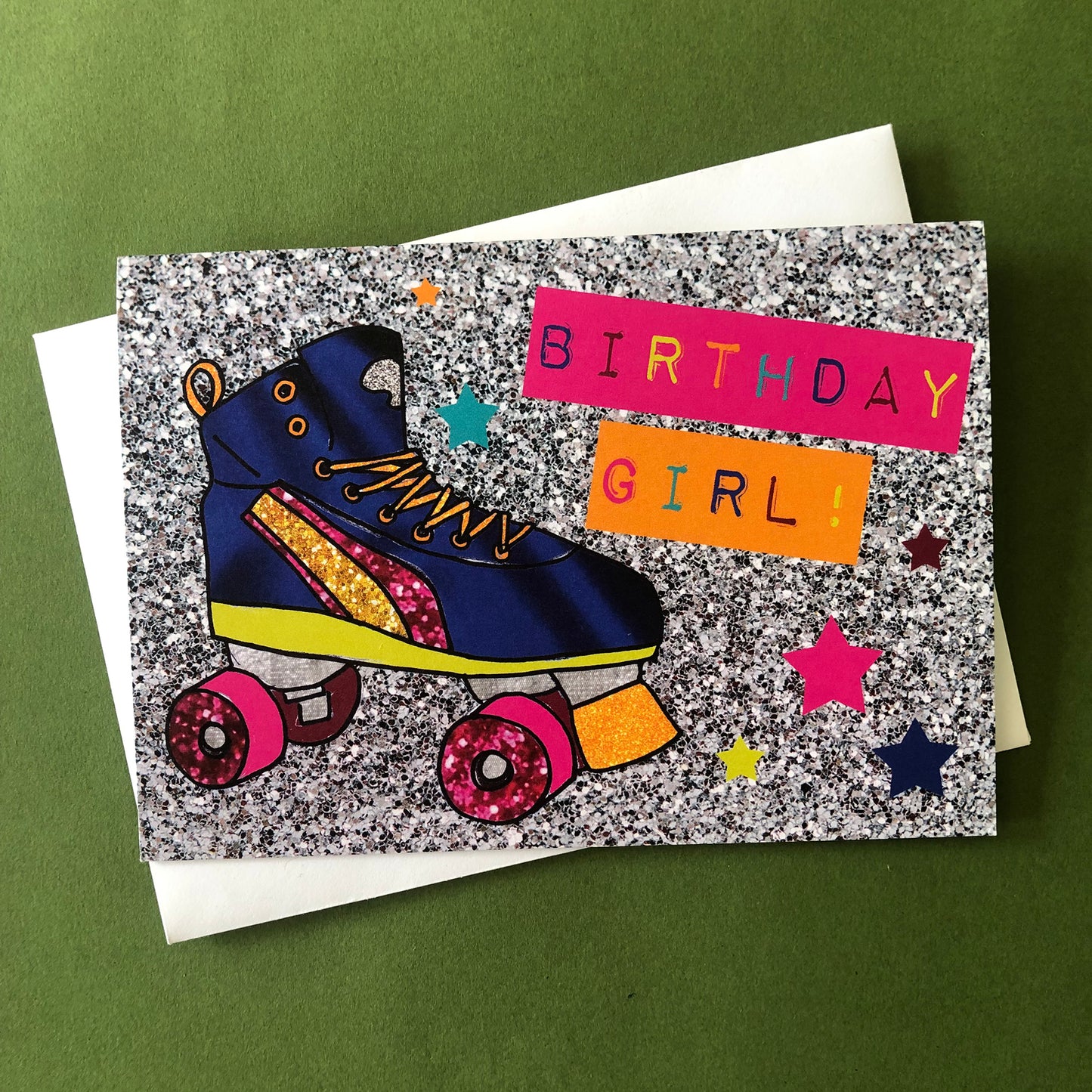 Image shows a neon and silver glitter roller boot birthday girl greetings card.