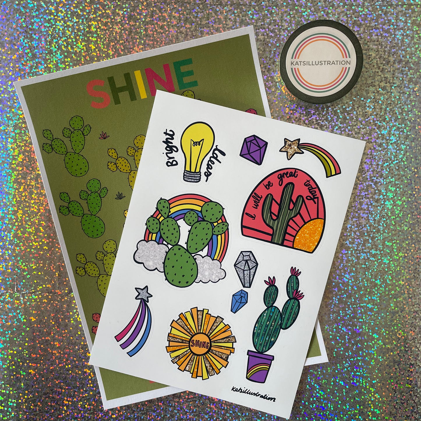 Image shows a bright and colourful sticker sheet with illustrated designs of cacti, gems and other bright designs.