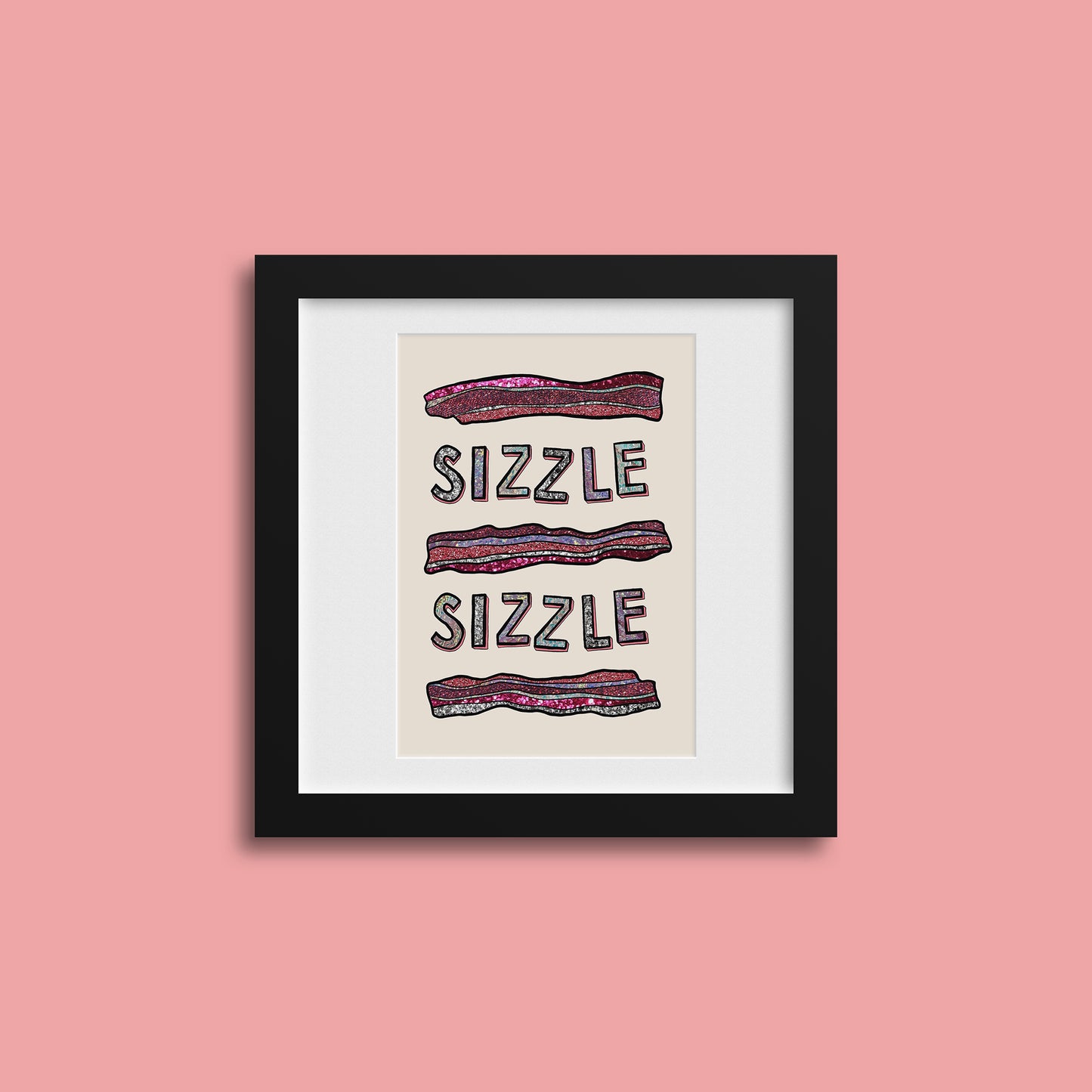 Image of a framed art print of a modern illustration glittery bacon and the words Sizzle Sizzle.