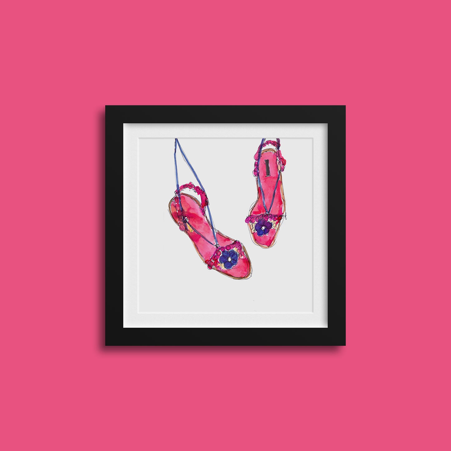 Framed art print of an ink illustration of a pair of pink and purple sandals with flowers on them.