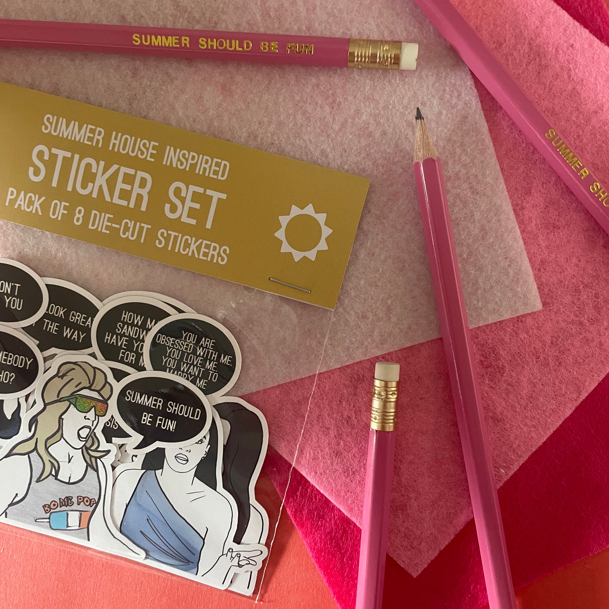 Image of a pink pencil with the words summer should be fun' embossed in gold lettering