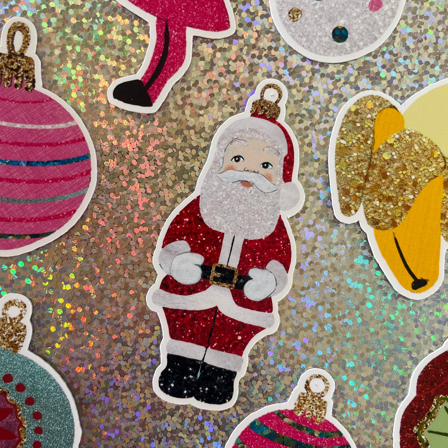 Image features a set of colourful Christmas stickers inspired by baubles.