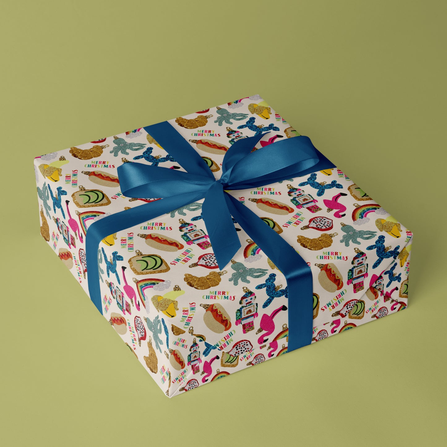 Image shows a wrapped gift fun trinkets gift wrap. The design features a quirky bauble pattern.