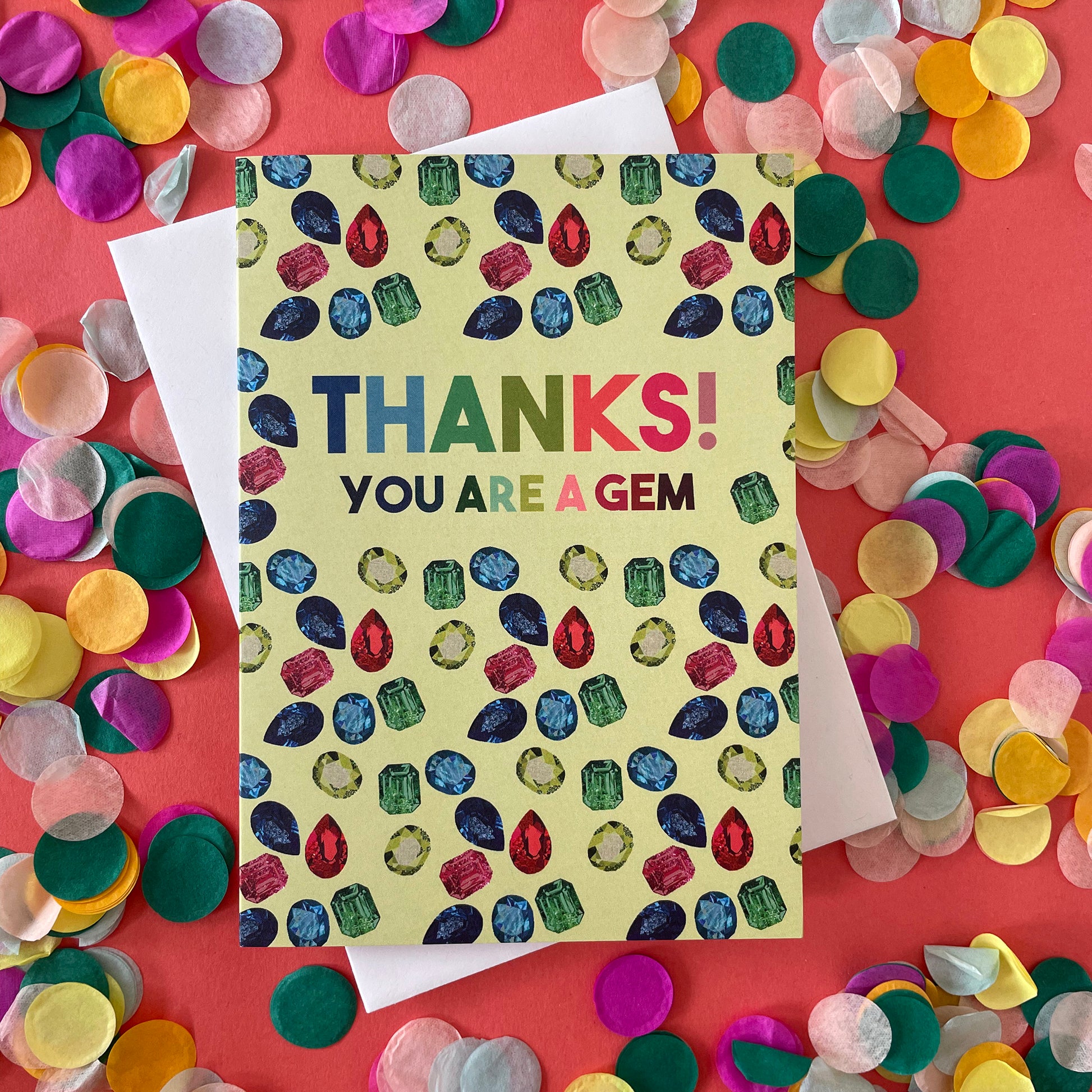 Image shows a light green greetings card with illustrations of gemstones and the words 'thanks you are a gem"