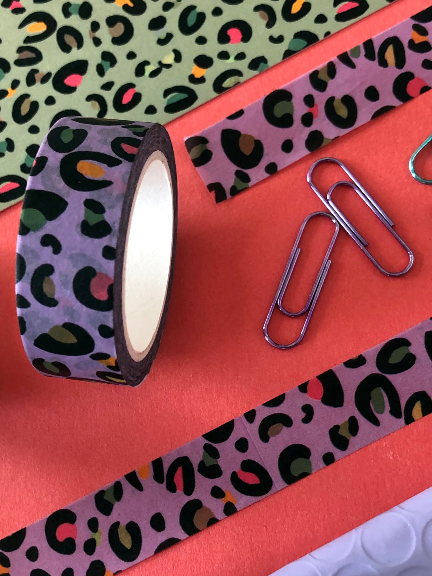 Bold, leopard print washi tape in a bright purple with pops of neon