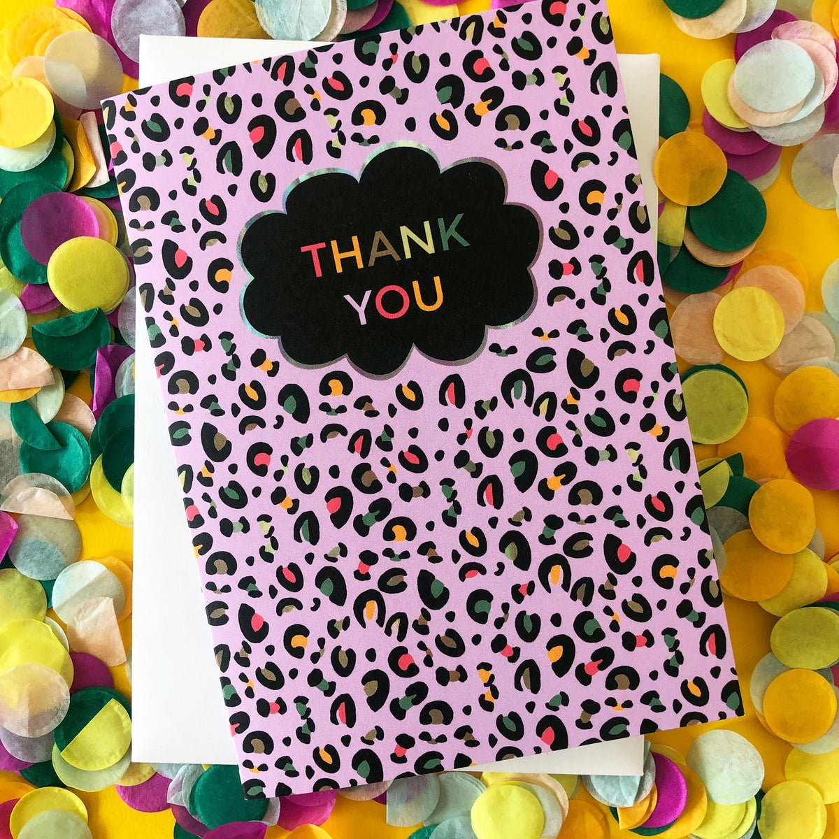 Image of a leopard Print Thank you card with lilac print and pops of neon.