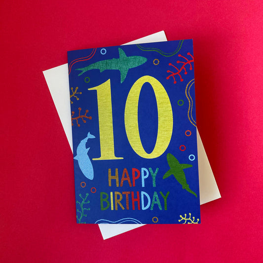 Birthday card with number 10 and sea-themed illustrations on a red background