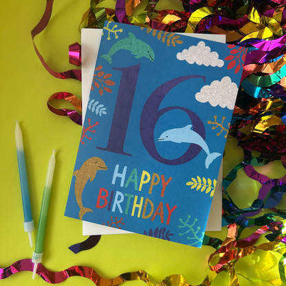 Birthday card with number 16 and dolphins on a colourful background