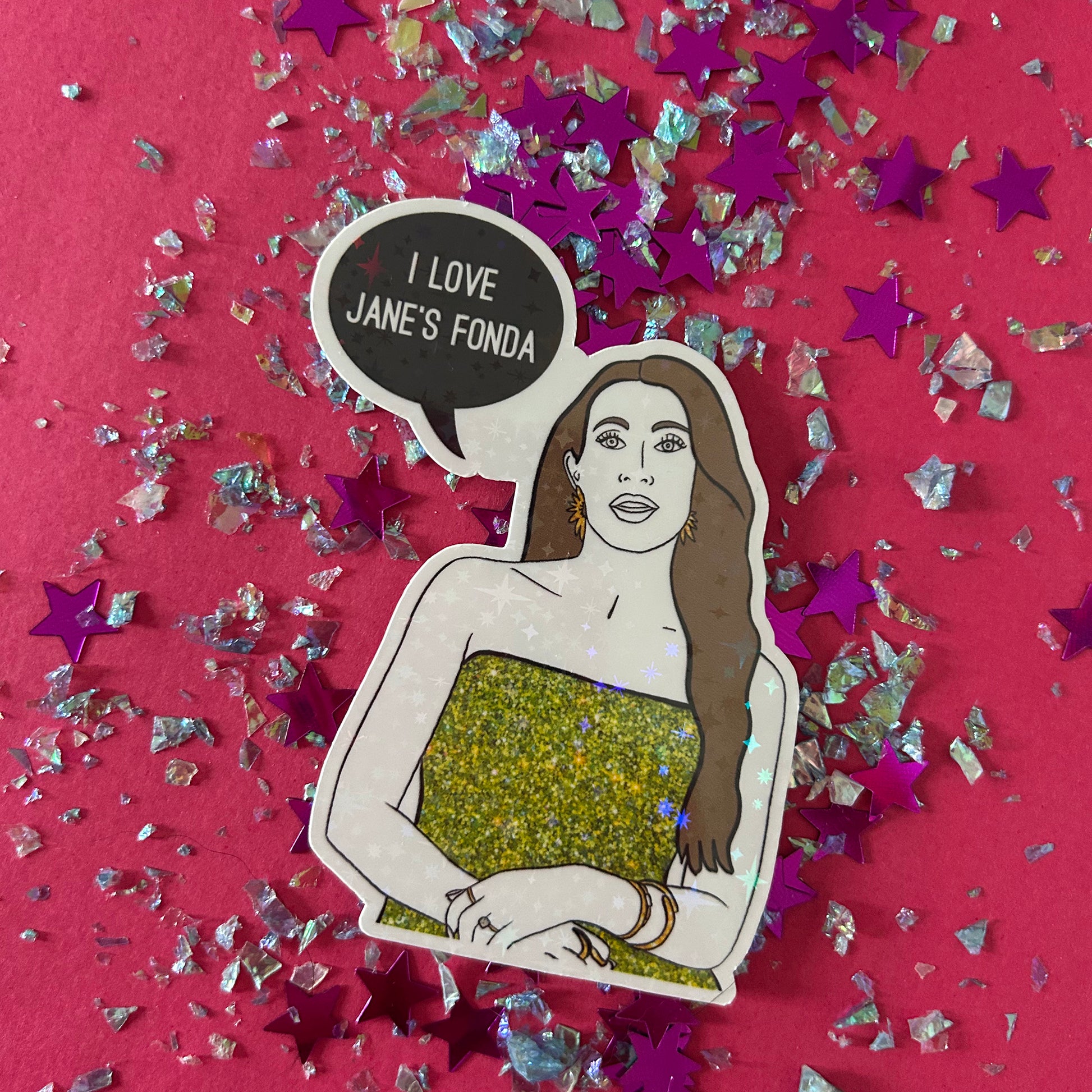 Sticker of a woman with a speech bubble saying 'I Love Jane's Fonda' on a pink background with star confetti.