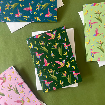 Image shows a beautiful set of 4 notecards with a hummingbird and bird of paradise plant pattern