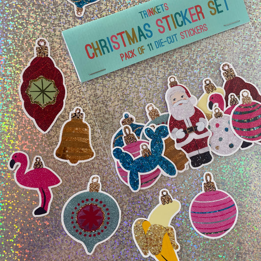 Image features a set of colourful Christmas stickers inspired by baubles.