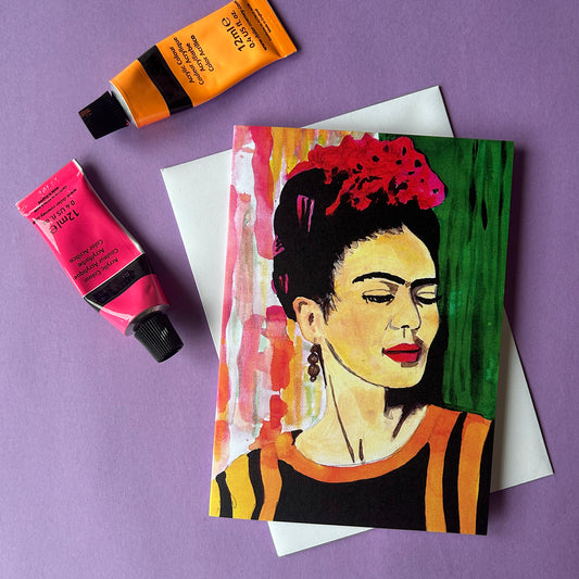 Card with Frida Kahlo illustration on a purple background with paint tubes.