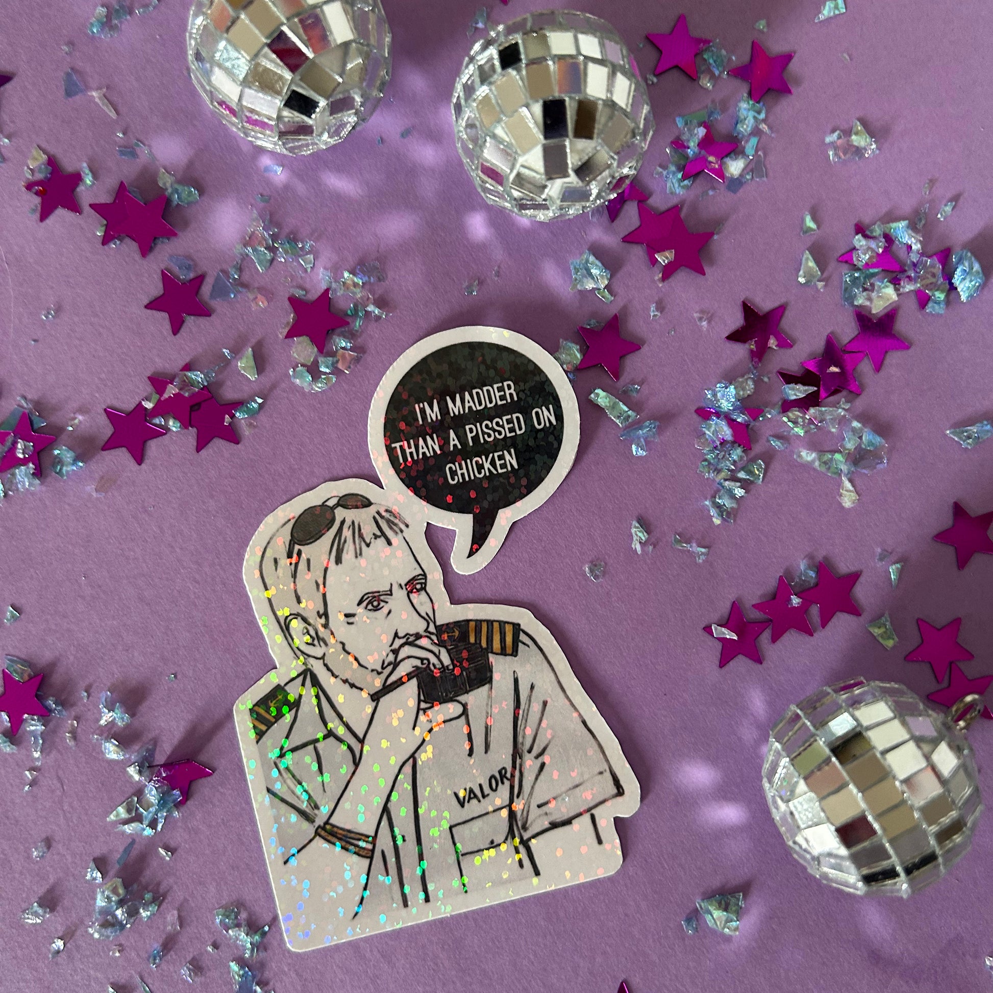 Sticker of a person with a speech bubble and disco balls on a purple background