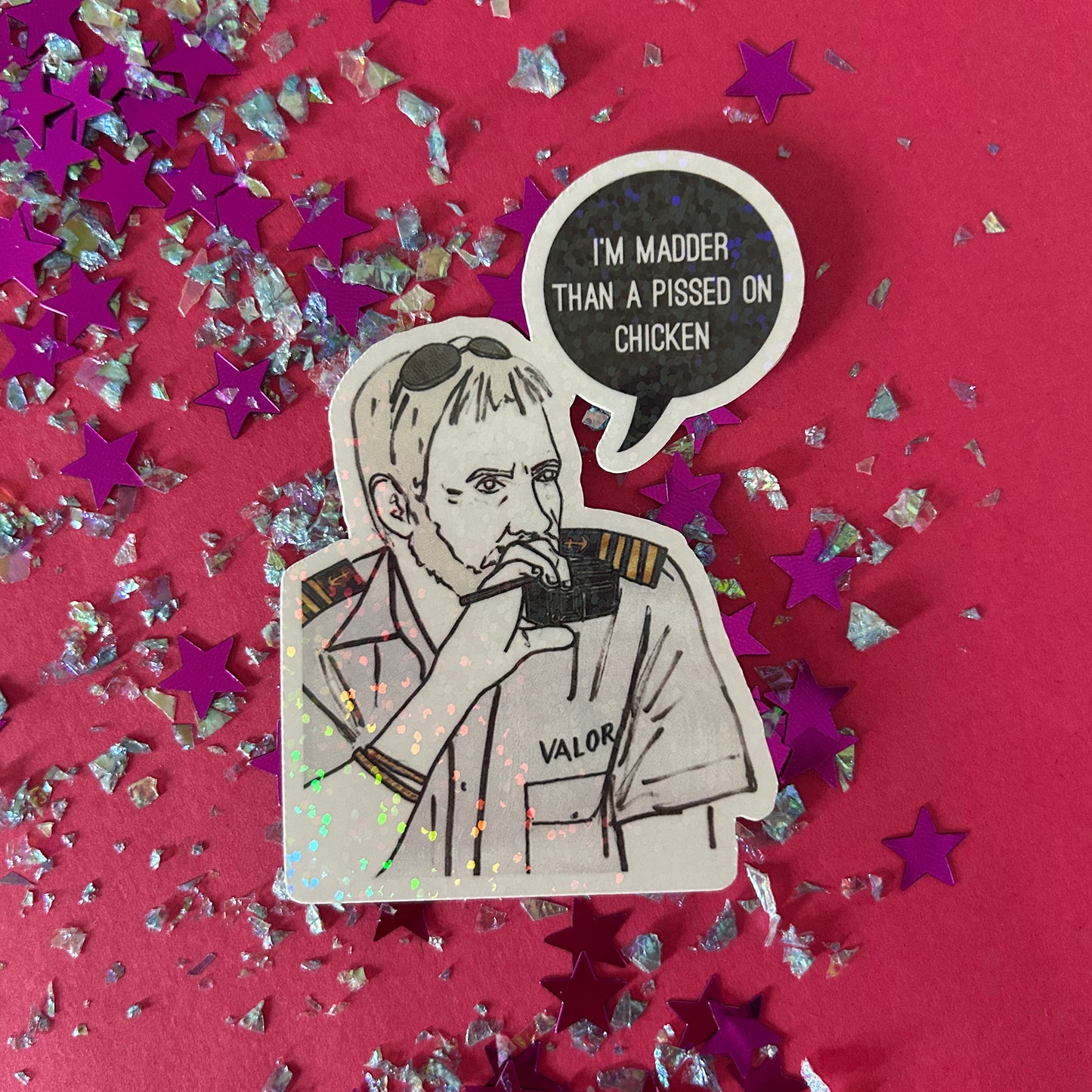 Sticker of a person with a speech bubble and text on a pink background with star-shaped confetti.