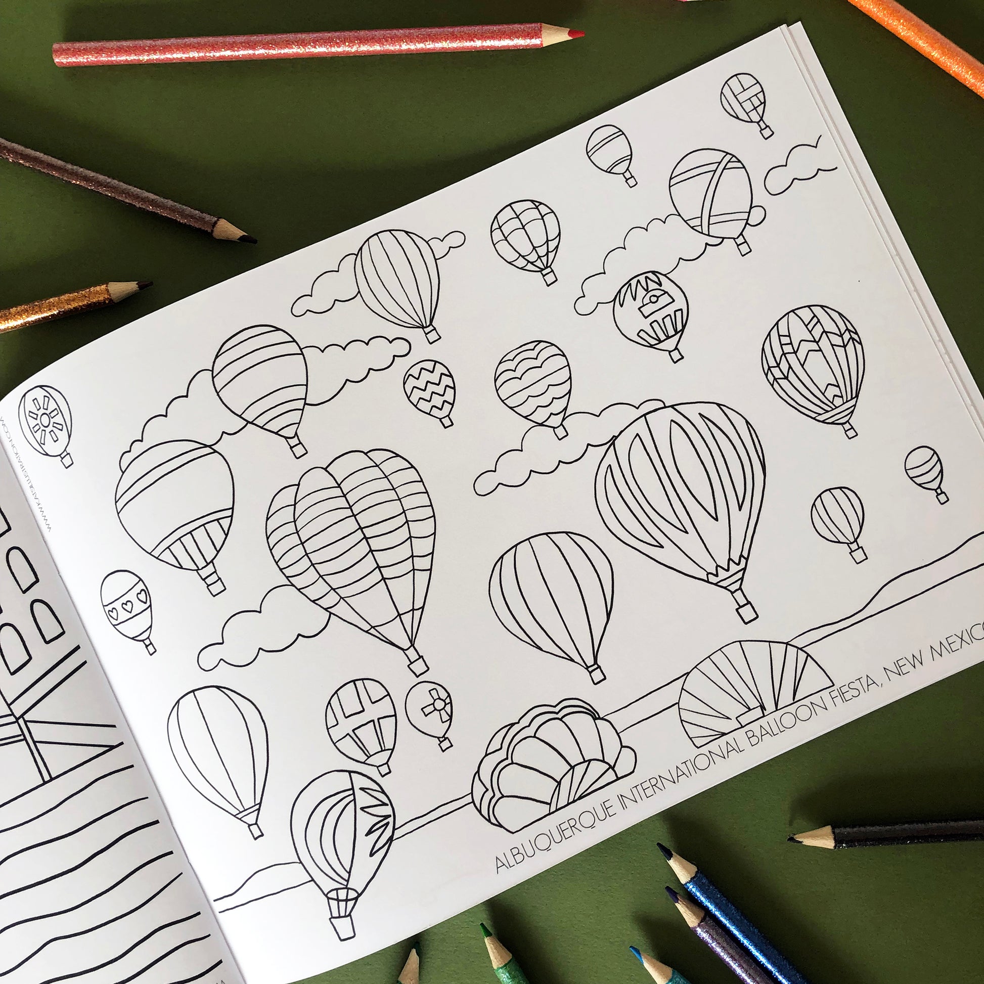 Image shows a page from a colouring book inspired by epic global festival Albuqerque International Balloon Fiesta