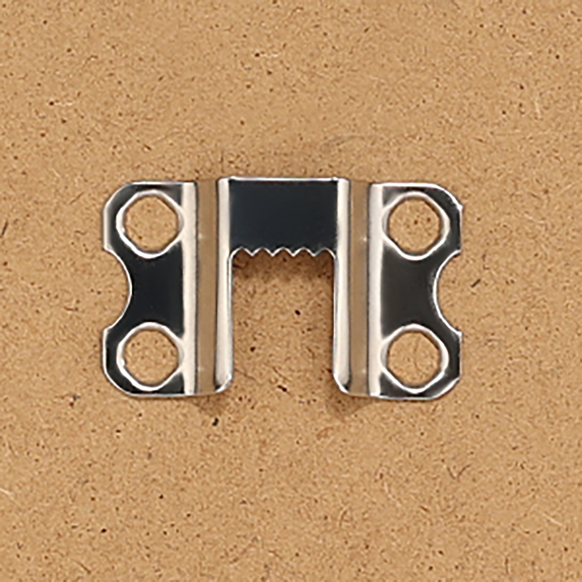 A metal attachment showing how you can hang you art print