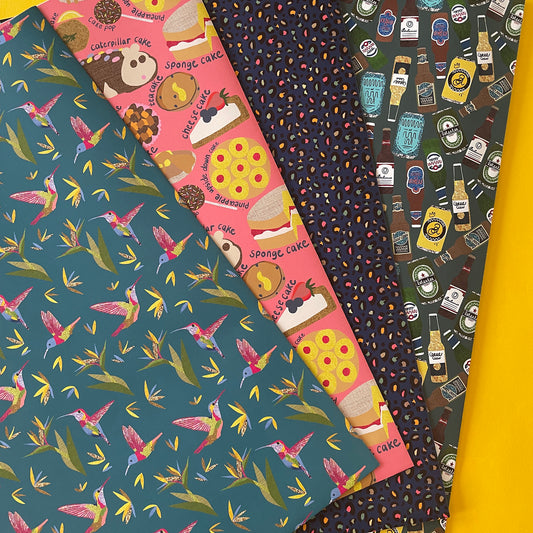 Image shows a selection of Katsillustration gift wrap in 4 different designs. 