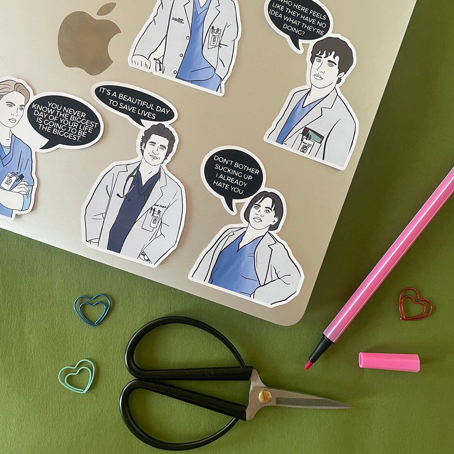 Image shows a set of hand drawn stickers inspired by the cast of Grey's Anatomy.