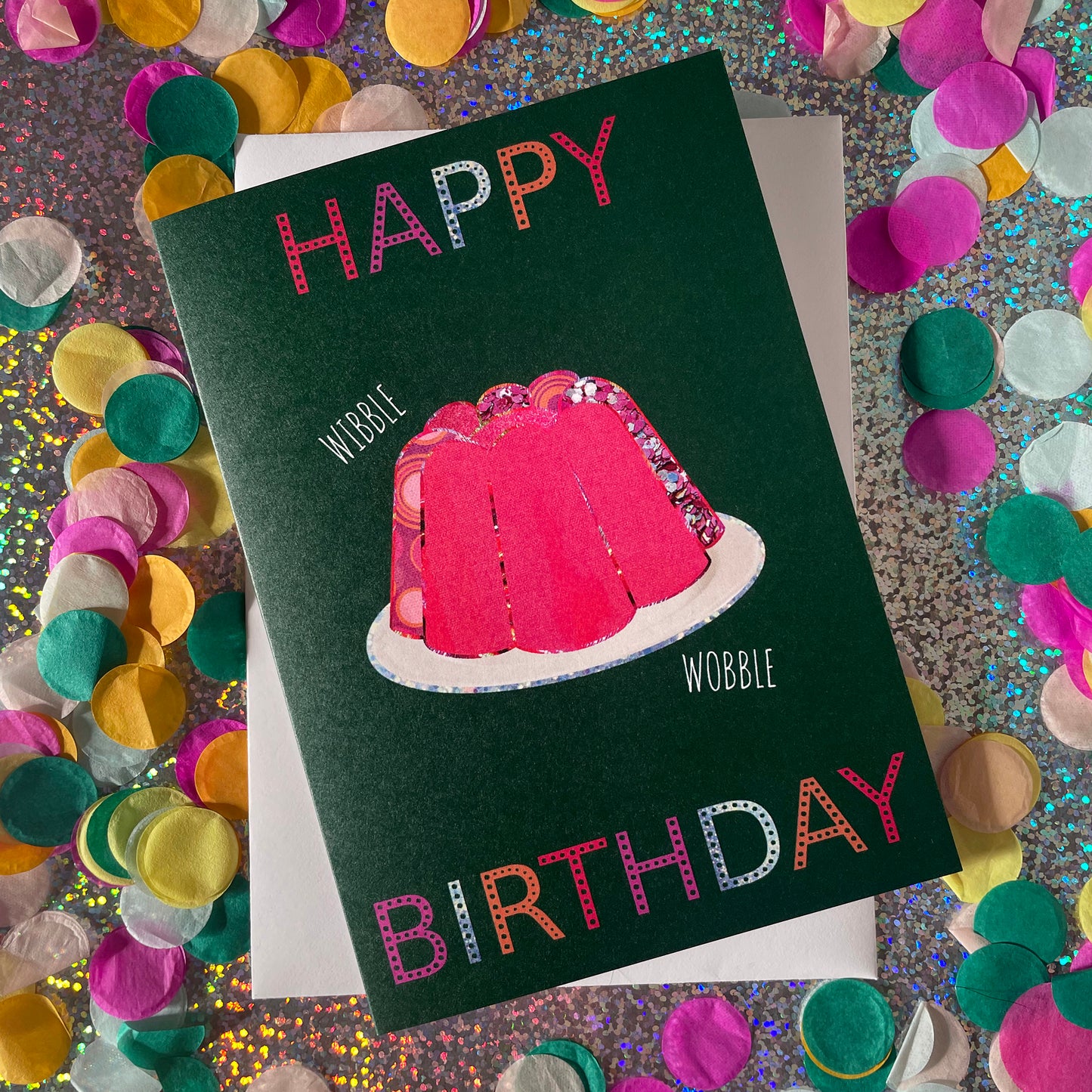 Image shows a green birthday card with a pink collaged jelly and 'Happy Birthday' in colourful lettering.