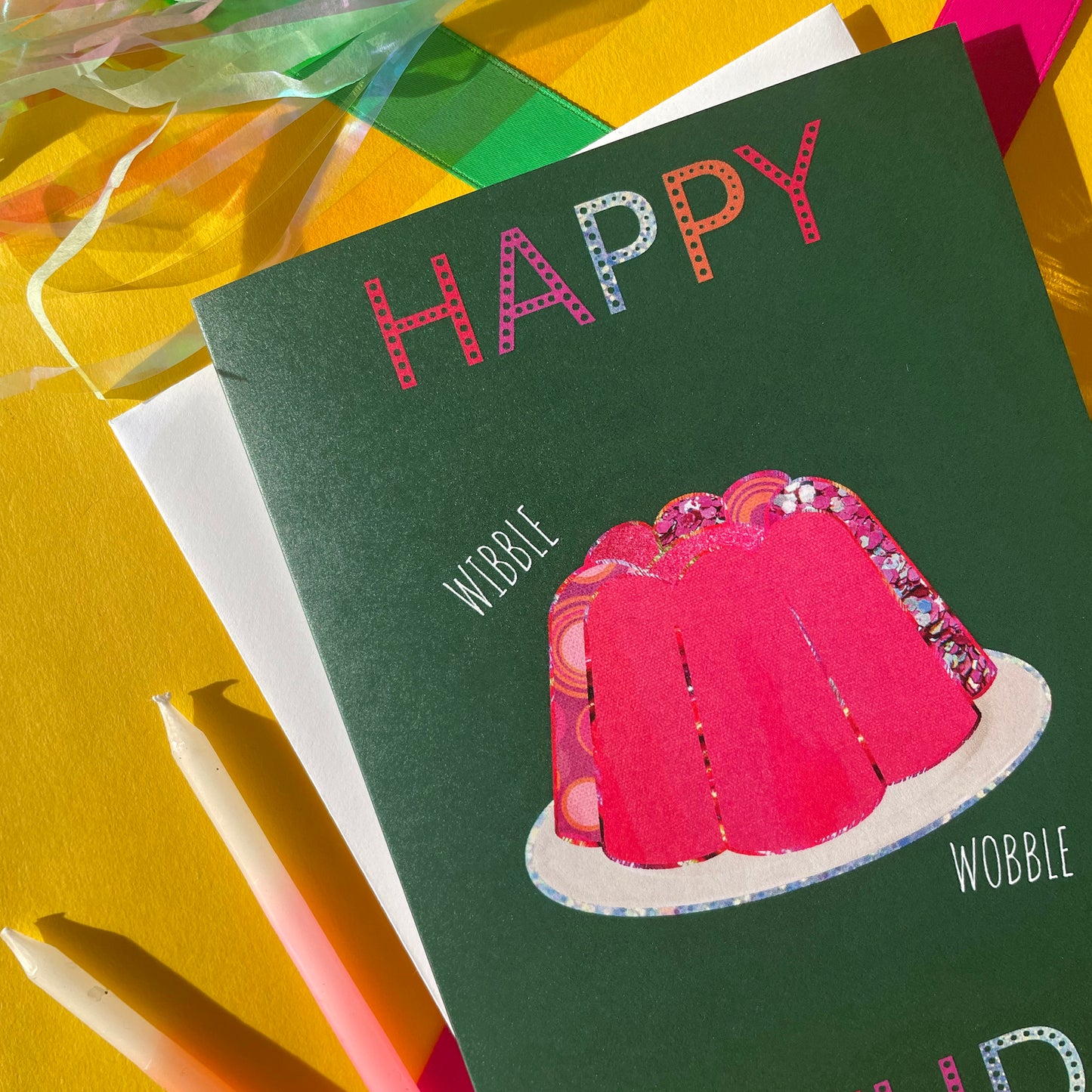 Image shows a green birthday card with a pink collaged jelly and 'Happy Birthday' in colourful lettering.