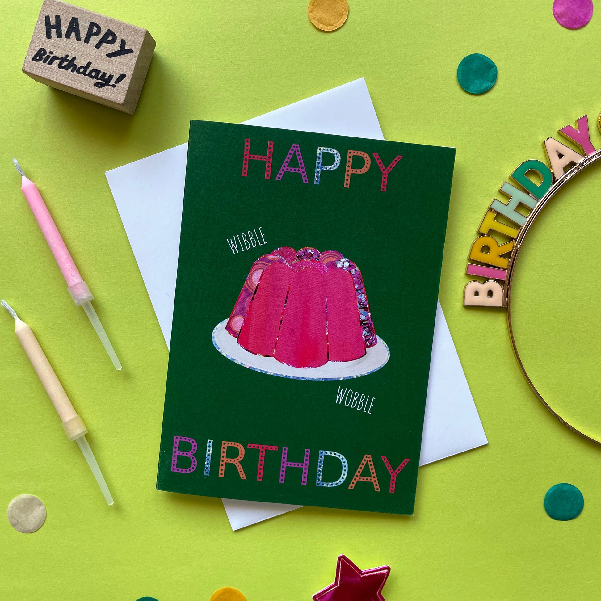 Image shows a green birthday card with a pink collaged jelly and 'Happy Birthday' in colourful lettering.