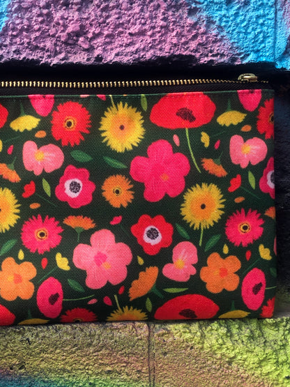 Useful zip pouch in a lush green colour with a pretty pink, yellow and orange floral print
