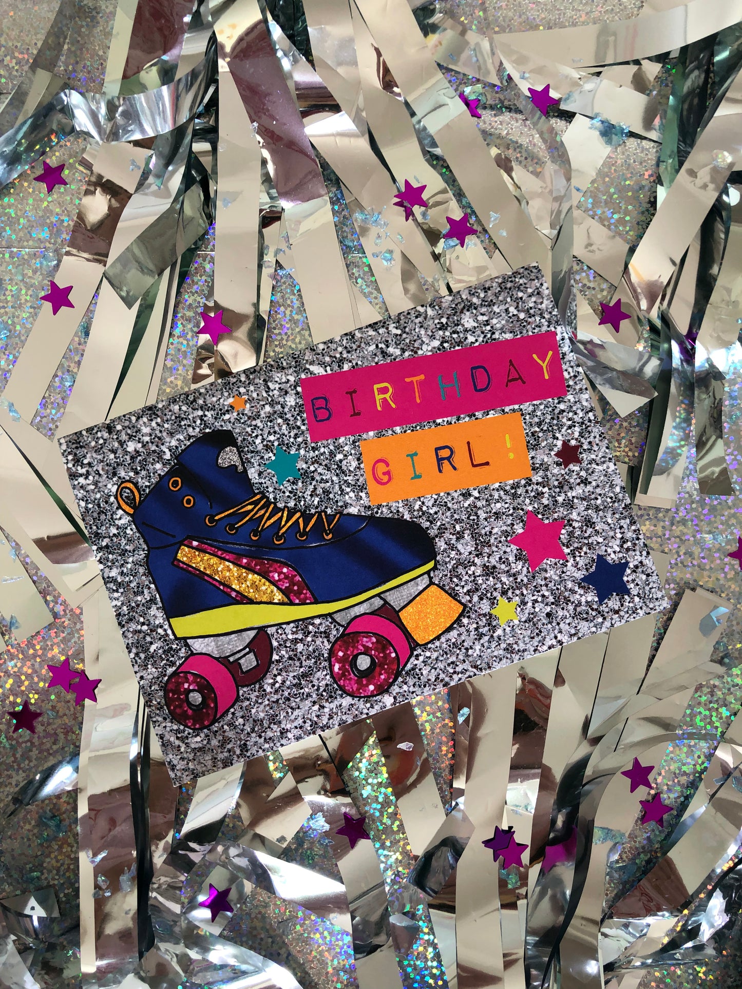 Neon and glitter rollerboot birthday girl card on a silver background.