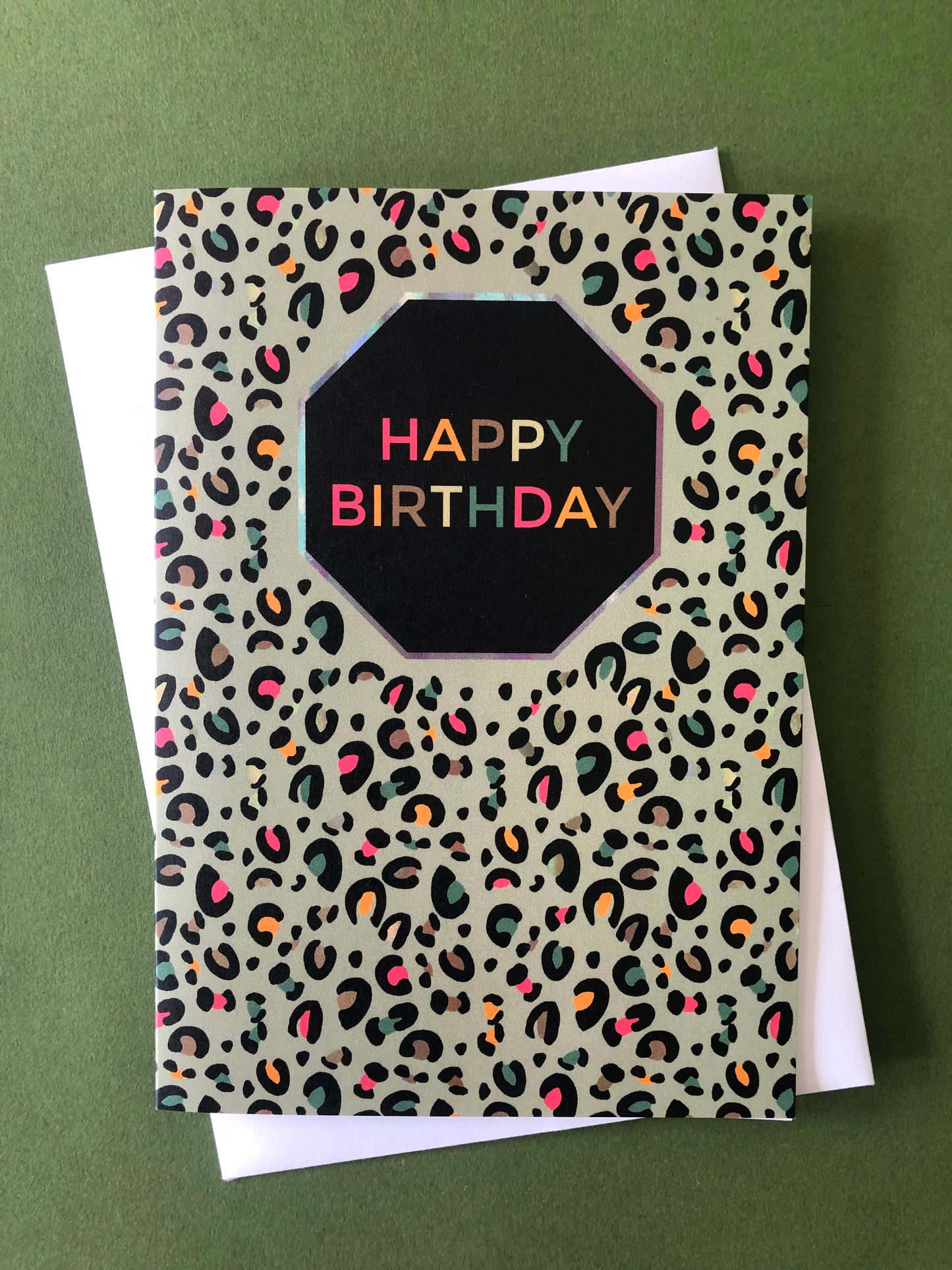 Fun Happy Birthday card with pale green leopard print and pops of neon.