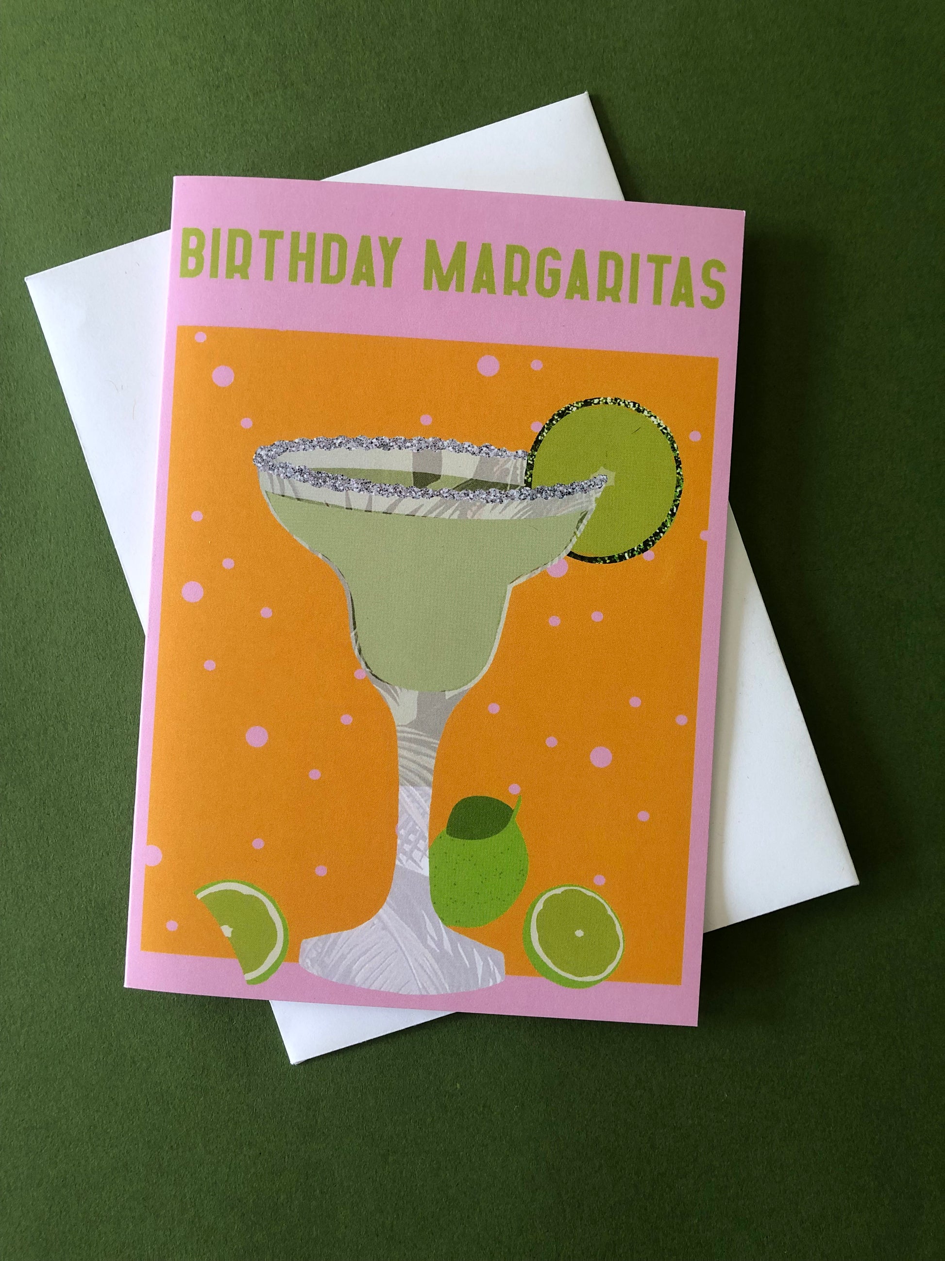 Bright and colourful birthday card featuring a margarita cocktail on a green background.