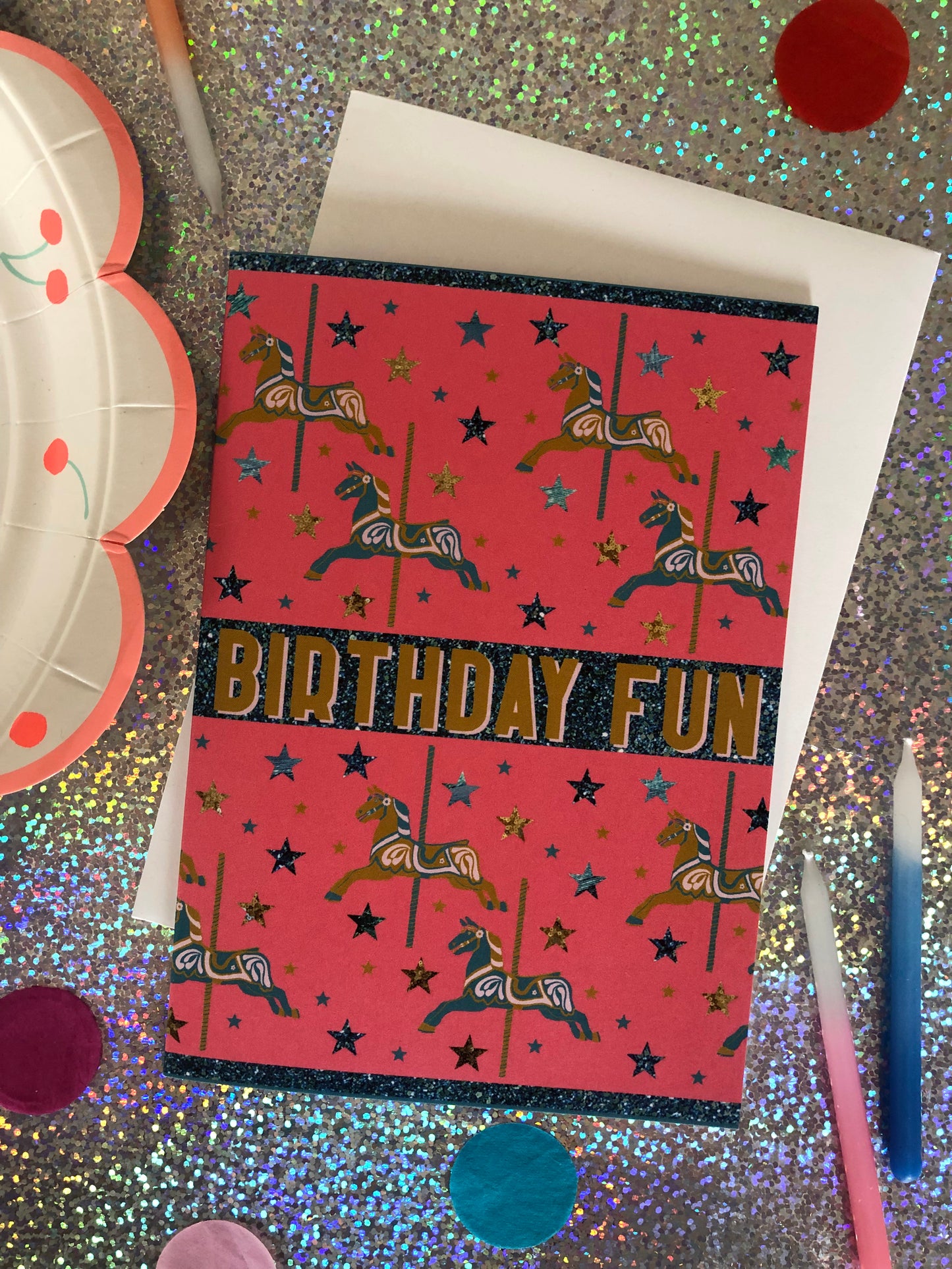 Bright and fun birthday card featuring a carousel horse design on a holographic background