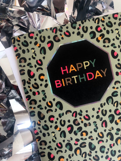 Fun Happy Birthday card with pale green leopard print and pops of neon.