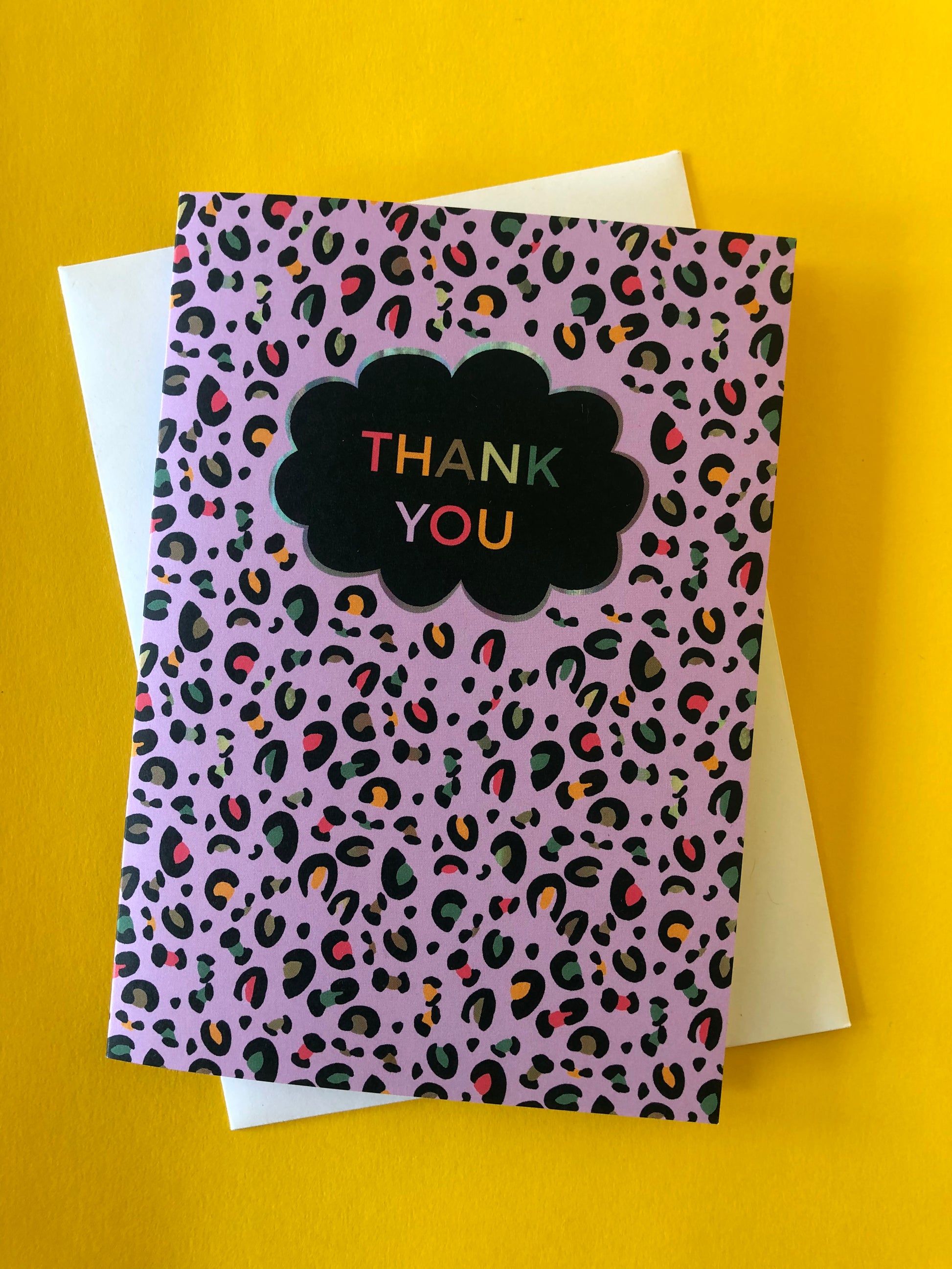 Leopard Print Thank you card with lilac print and pops of neon.